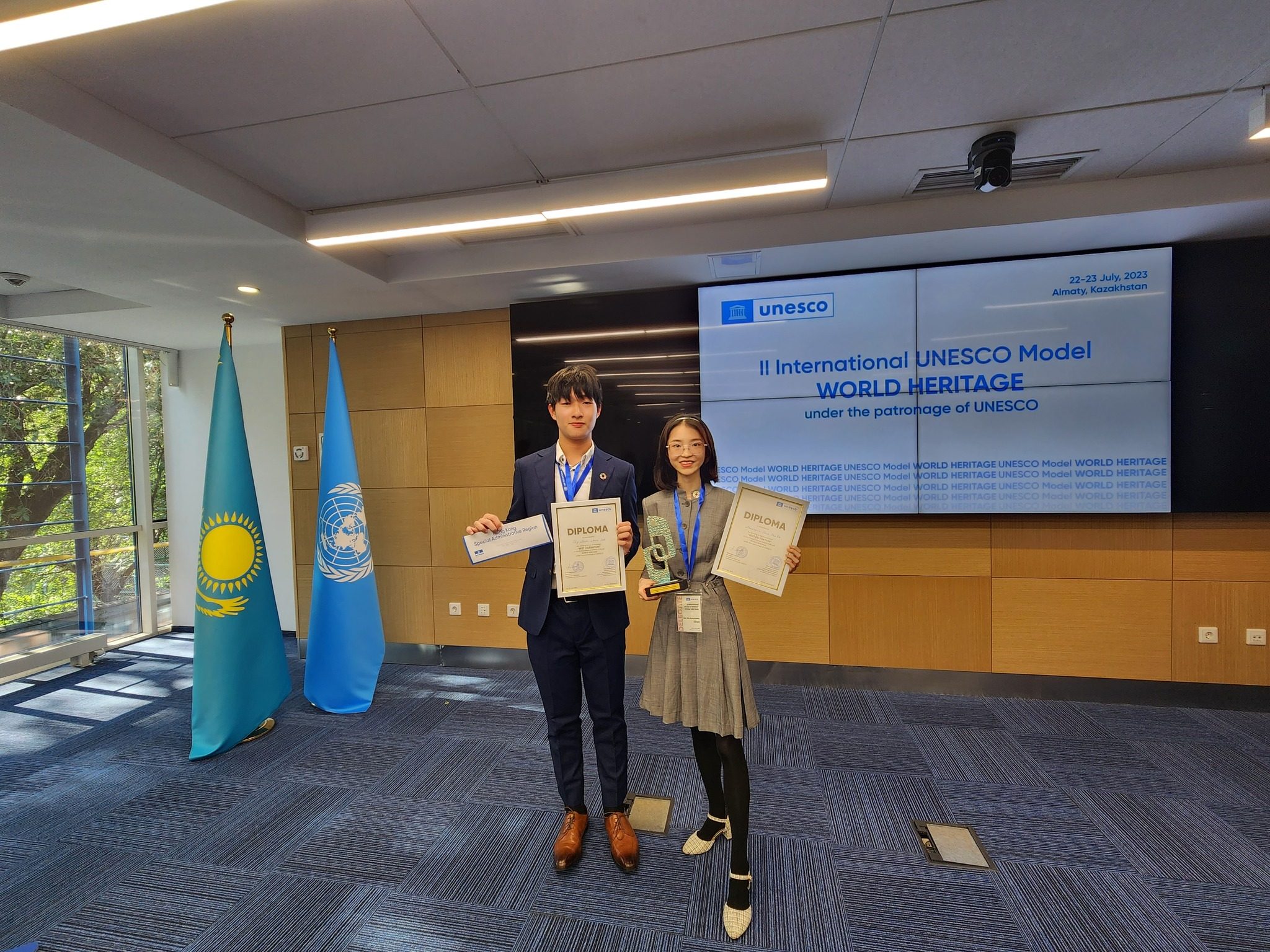 Sky Lee (from left) and Americana Chen have won the Best Delegation award at the Second International Unesco Model Conference. Photo: Unesco Hong Kong Association