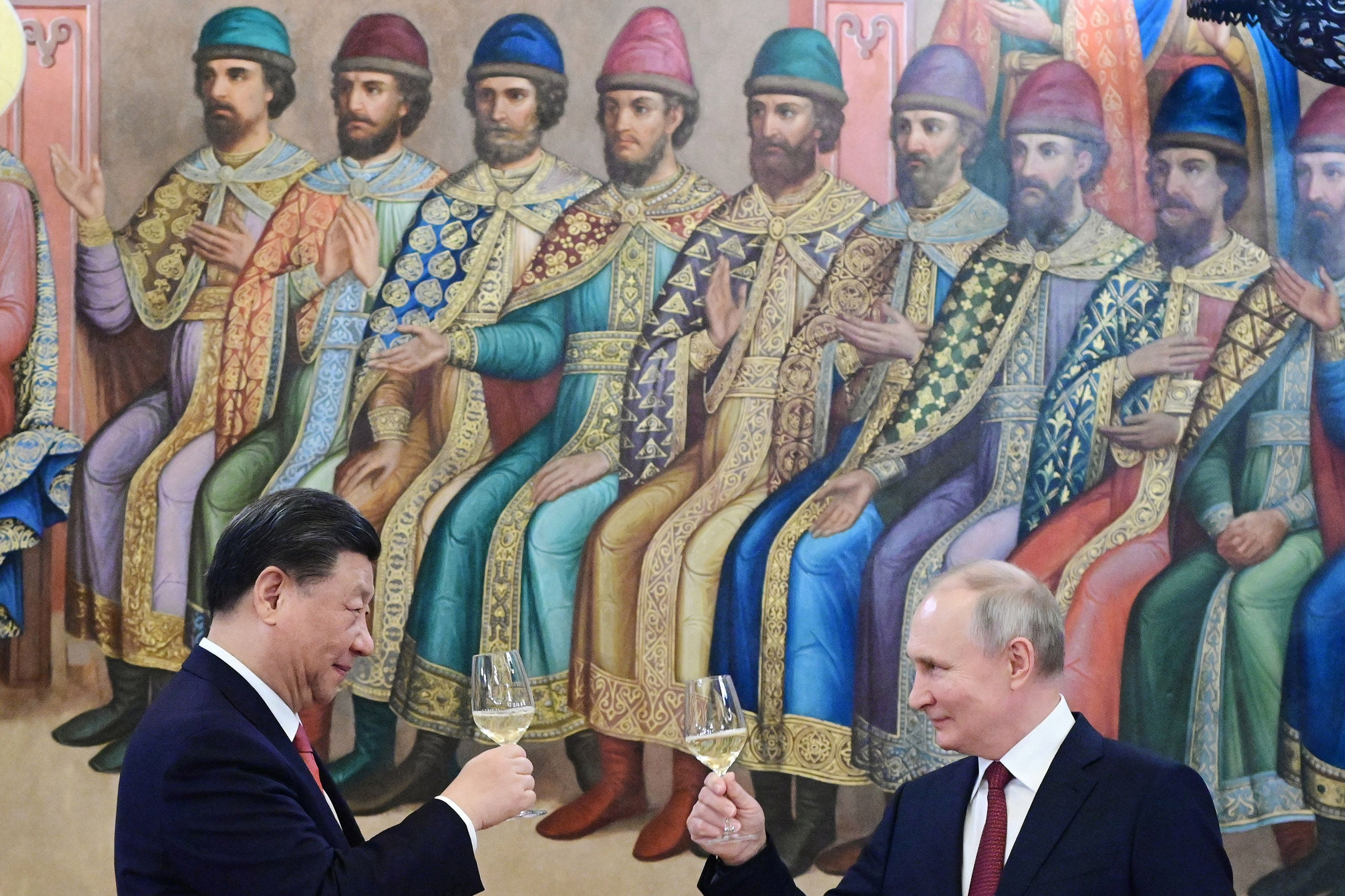 Russian President Vladimir Putin (right) and President Xi Jinping make a toast during a reception following their talks at the Kremlin in Moscow on March 21. Despite the public displays of goodwill and friendship between the Russian and Chinese governments, there are still deep distrust and hard feelings dating back more than a century between the two sides. Photo: AFP