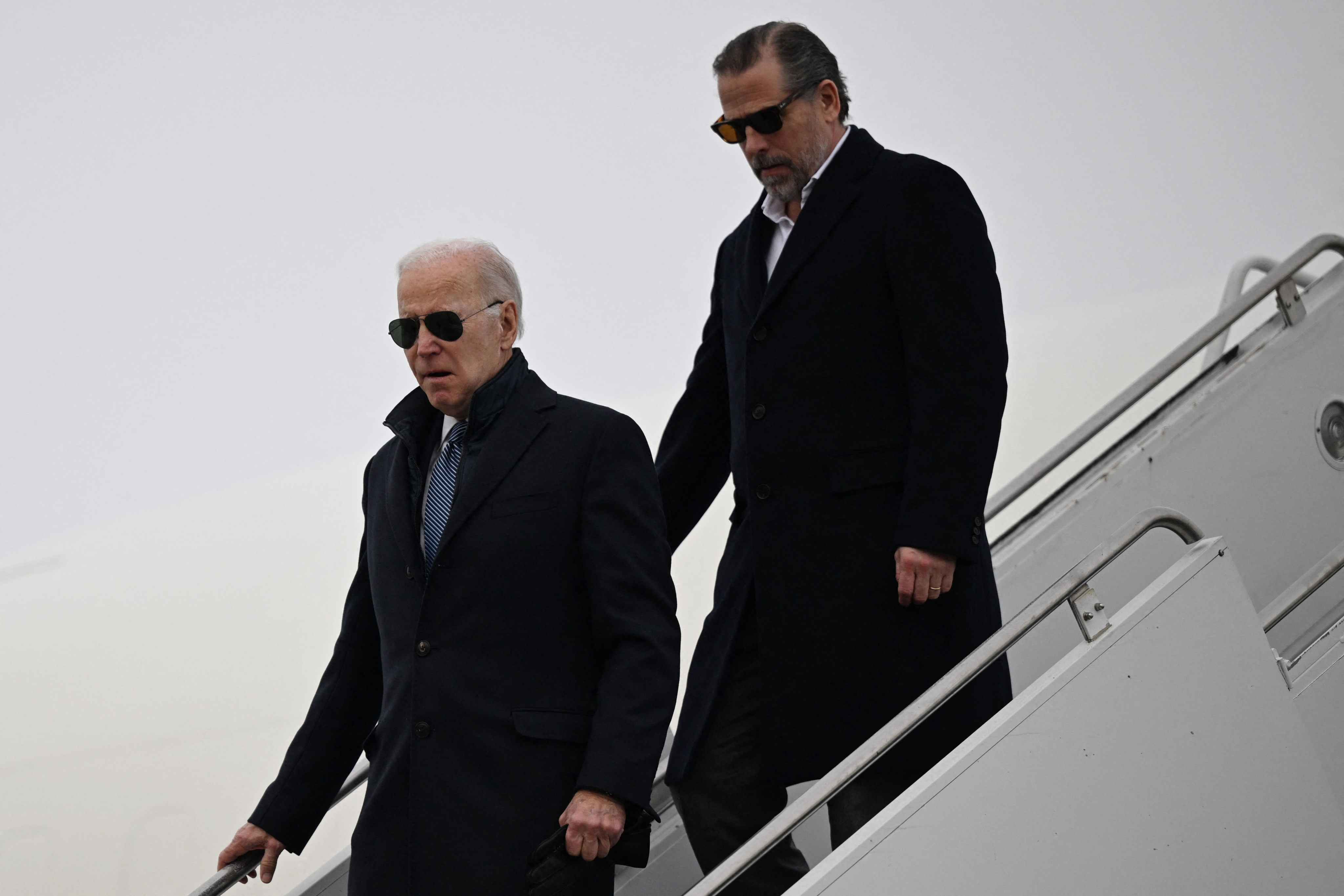 US President Joe Biden (left) and his son Hunter Biden arrive at Hancock Field Air National Guard Base in Syracuse, New York, on February 4. The US Justice Department has escalated its investigation into Hunter Biden, naming a special counsel amid allegations he engaged in illicit business deals overseas. Photo: AFP