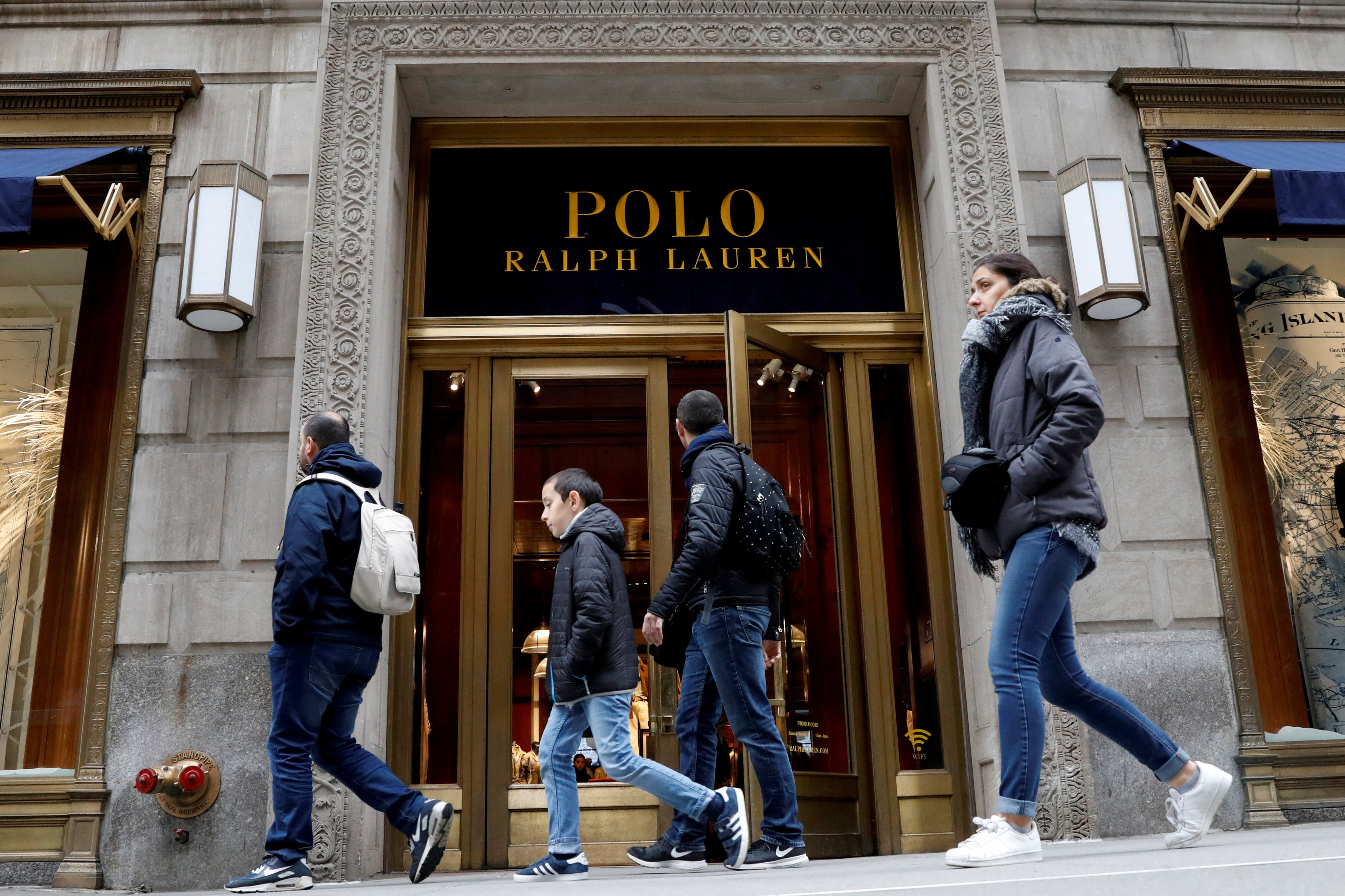 People walk past Ralph Lauren Corp’s  flagship Polo store on Fifth Avenue in New York in April 2017. Photo: Reuters