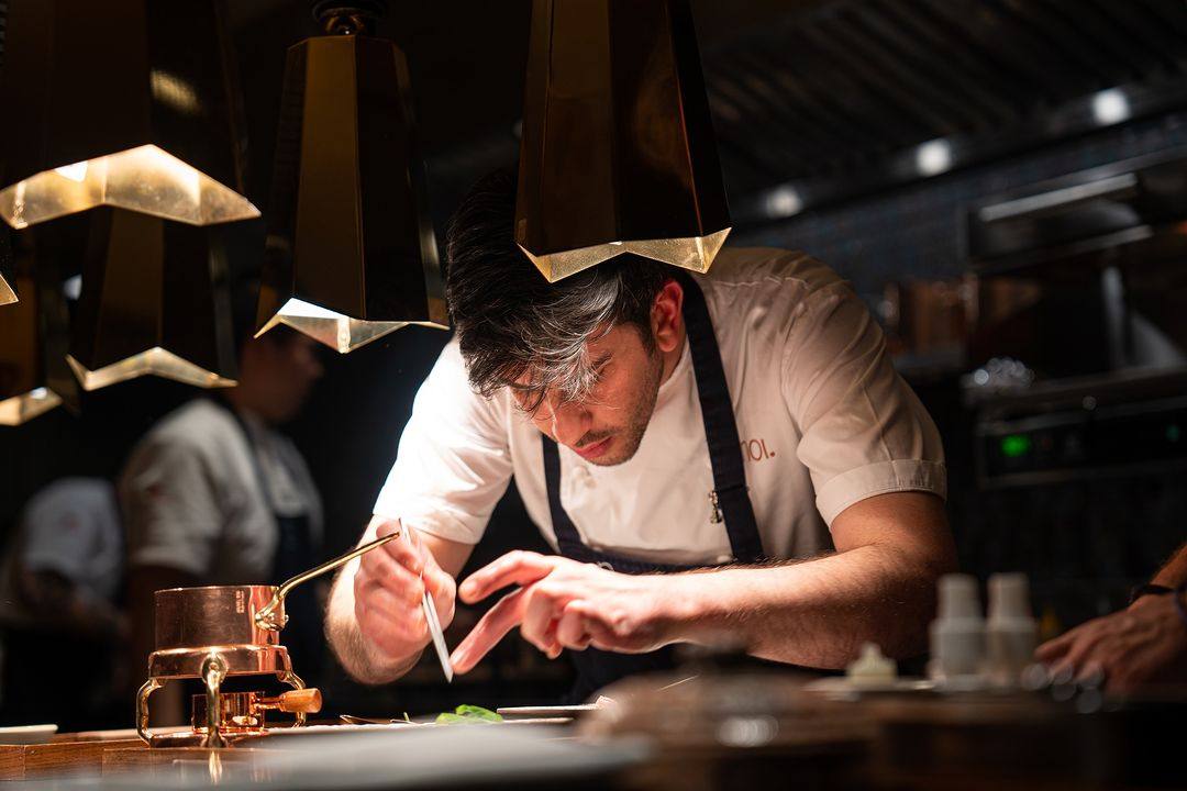 Luigi Troiano, head chef, works in the open kitchen at Noi in the Four Seasons Hong Kong. Photo: Instagram/@noihongkong