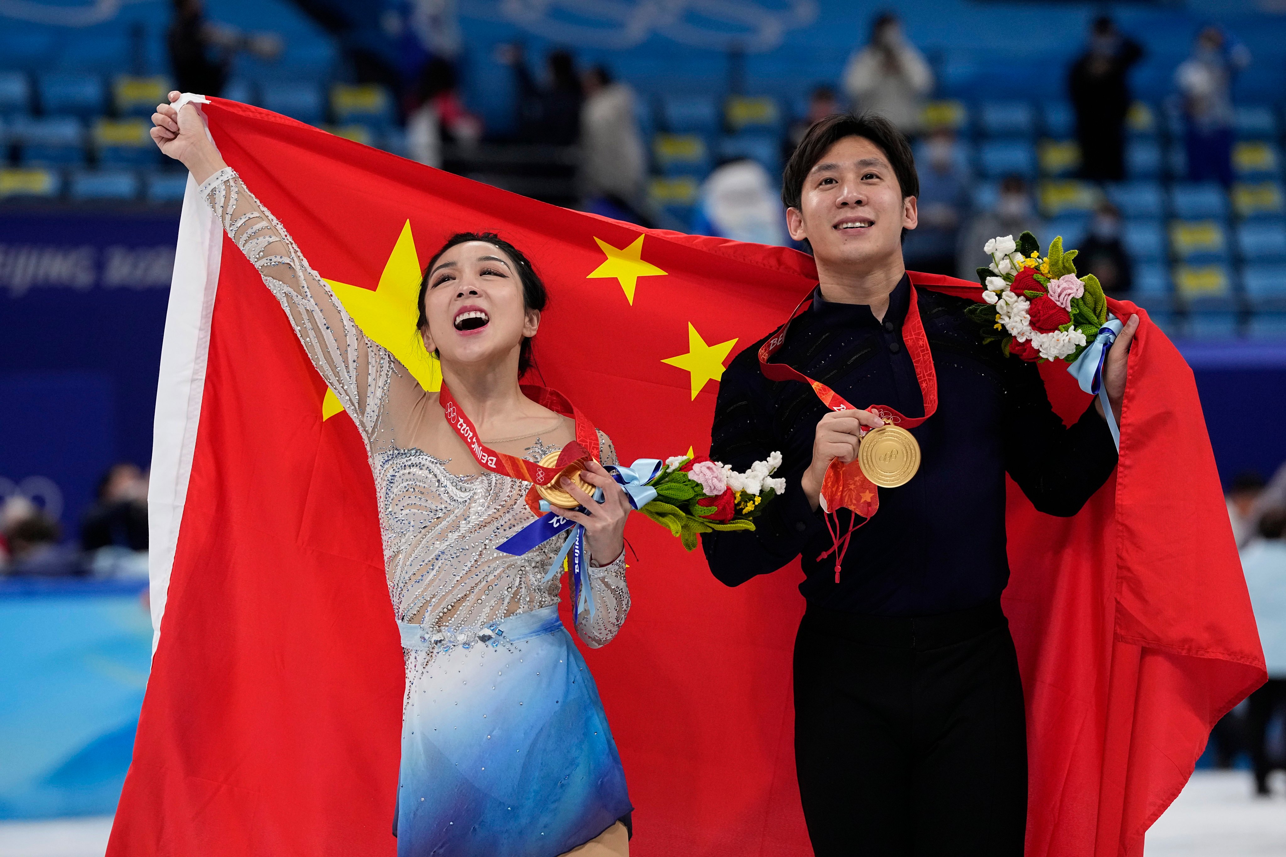 Olympic champion Sui Wenjing says she ‘understands’ her partner Han Cong’s decision to retire because of injury.,Photo: AP