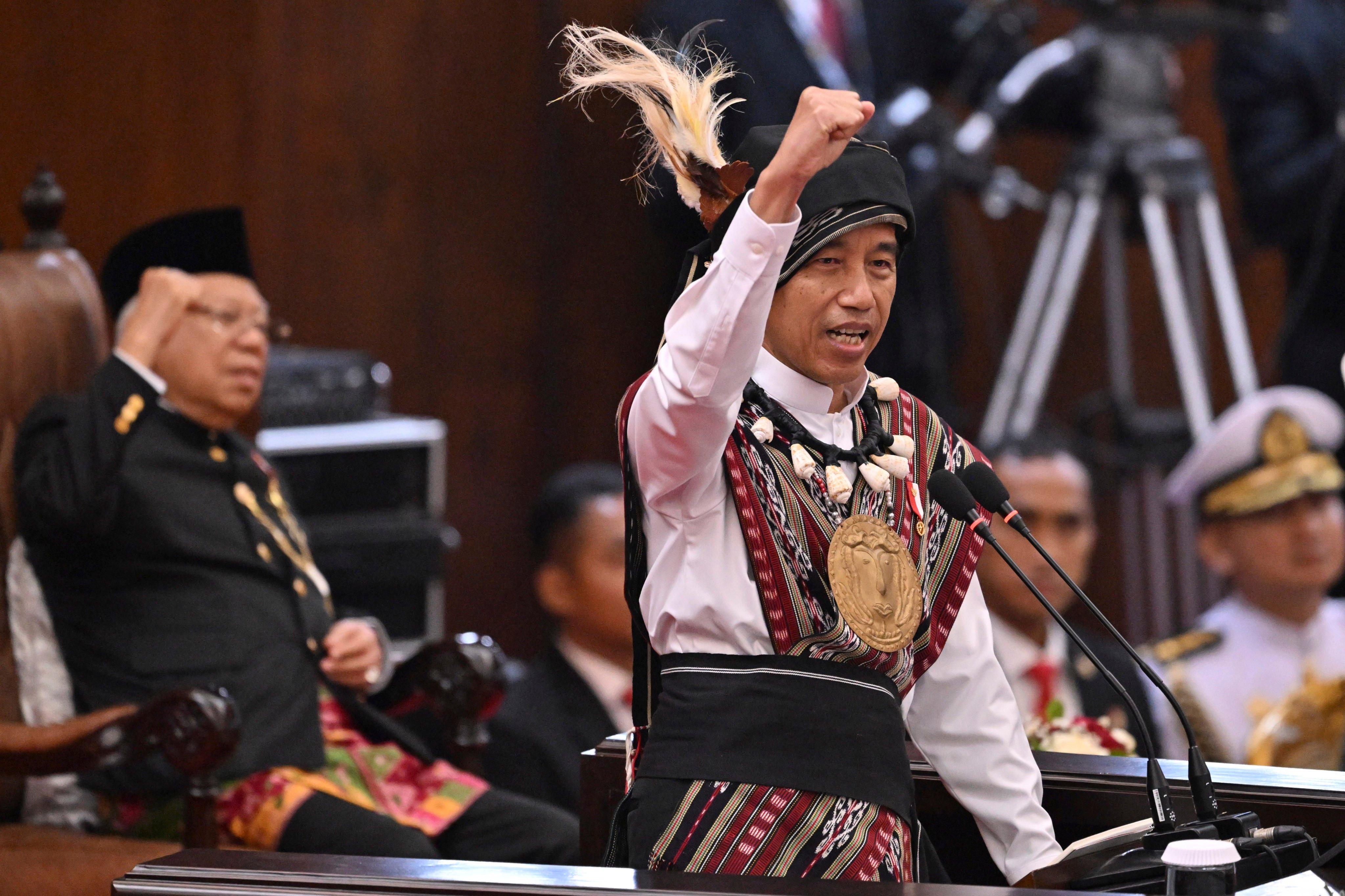 Indonesian President Joko Widodo, wearing traditional attire from Tanimbar Islands of Maluku province, delivers his State of the Nation Address on Wednesday. Photo: Pool via AP