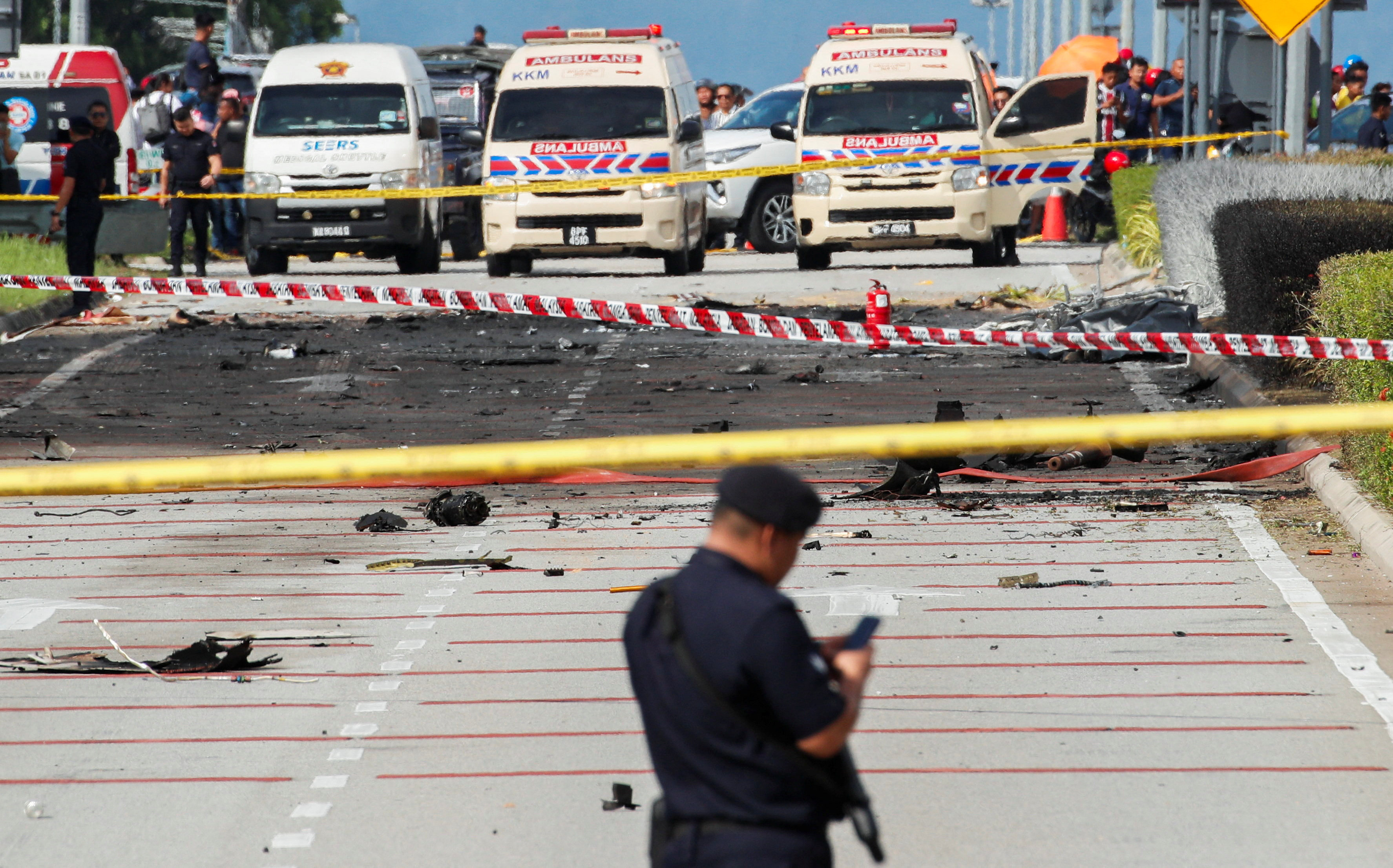 Police on the scene of the crash in Shah Alam, on August 17. Photo: Reuters