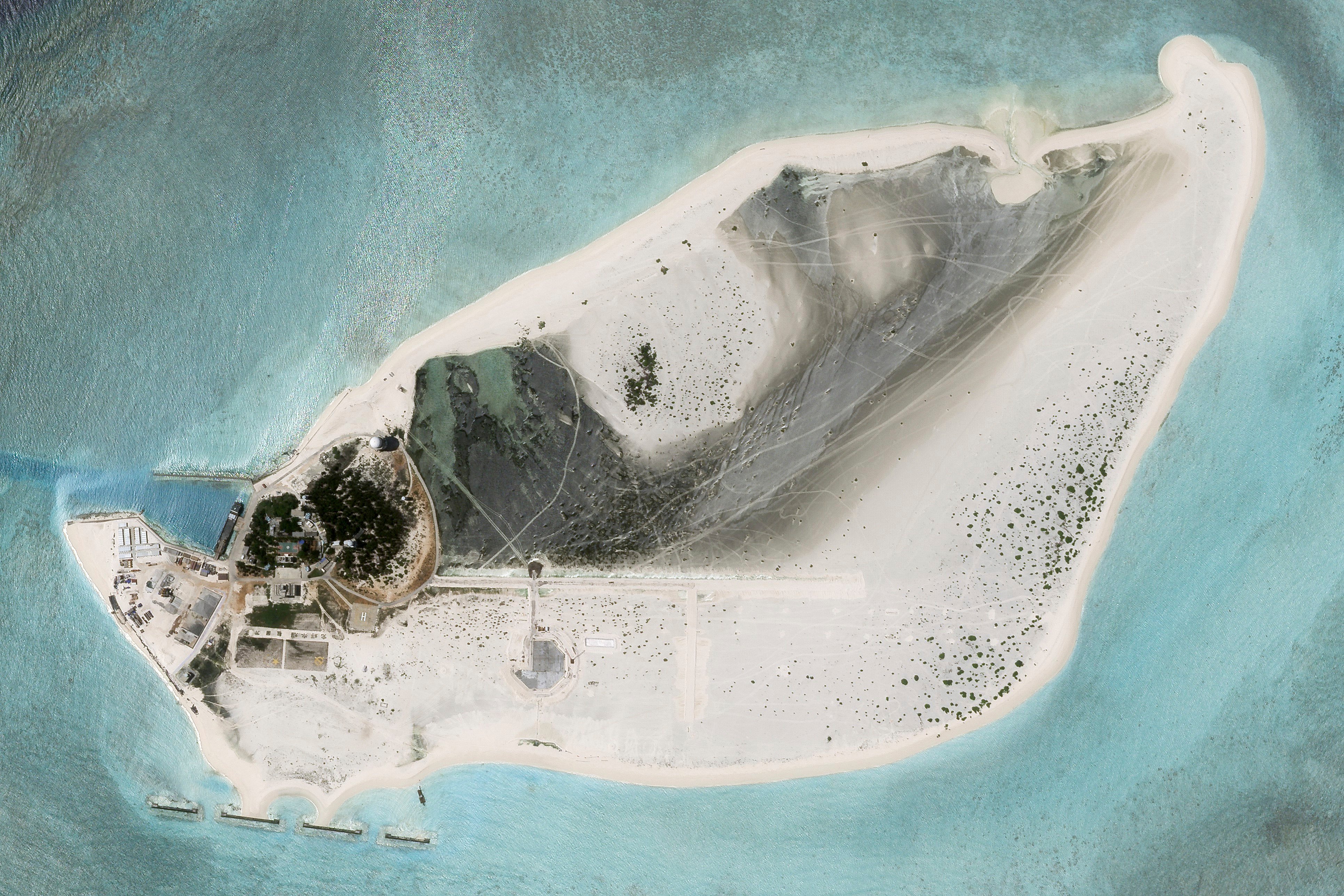 In addition to the airstrip, China appears to be constructing a new building on Triton Island, according to satellite images. Photo: Planet Labs PBC via AP