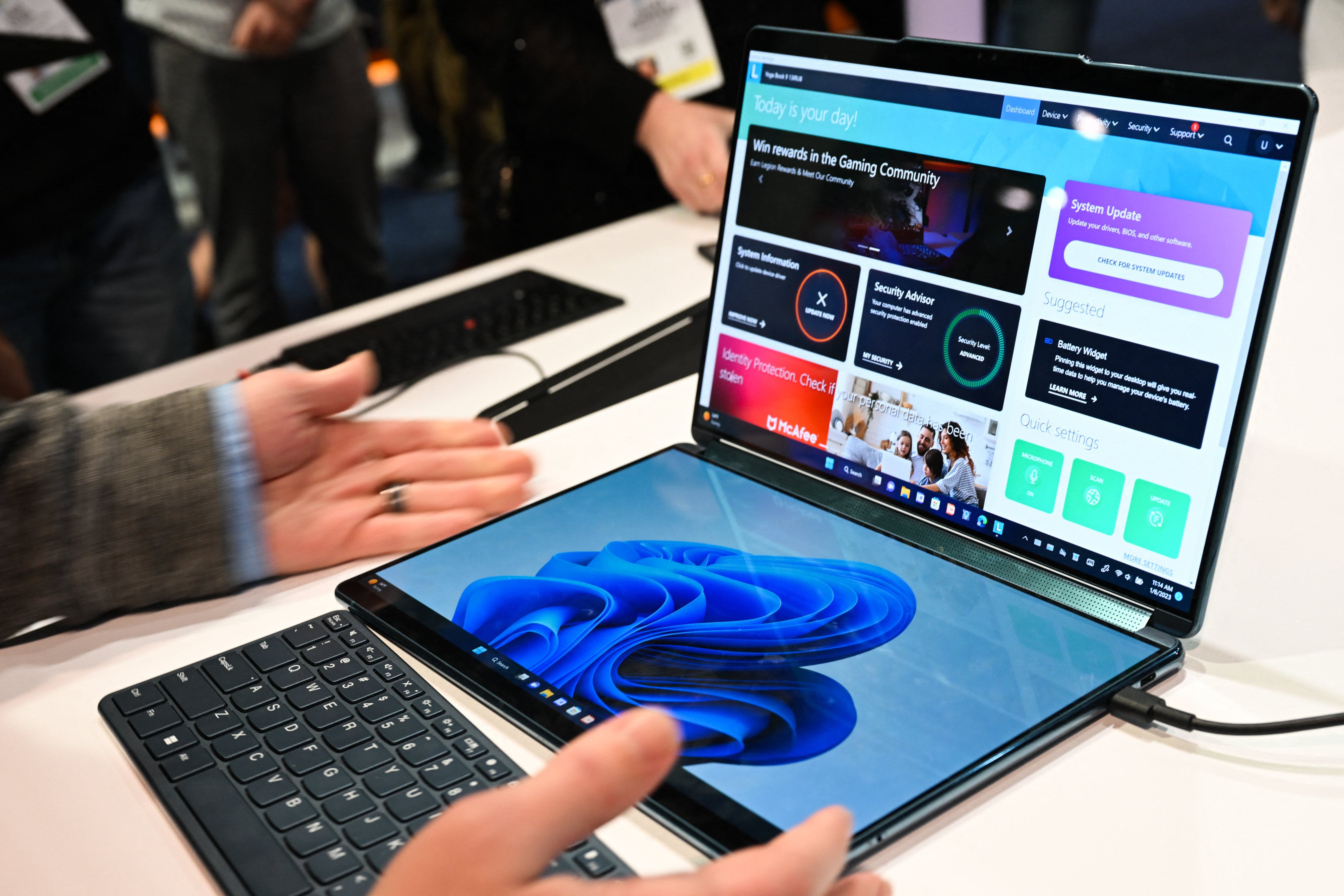 A Lenovo Yoga Book 9i dual-screen laptop on display at the Microsoft booth during the Consumer Electronics Show (CES) in Las Vegas, on January 6, 2023. Photo: AFP