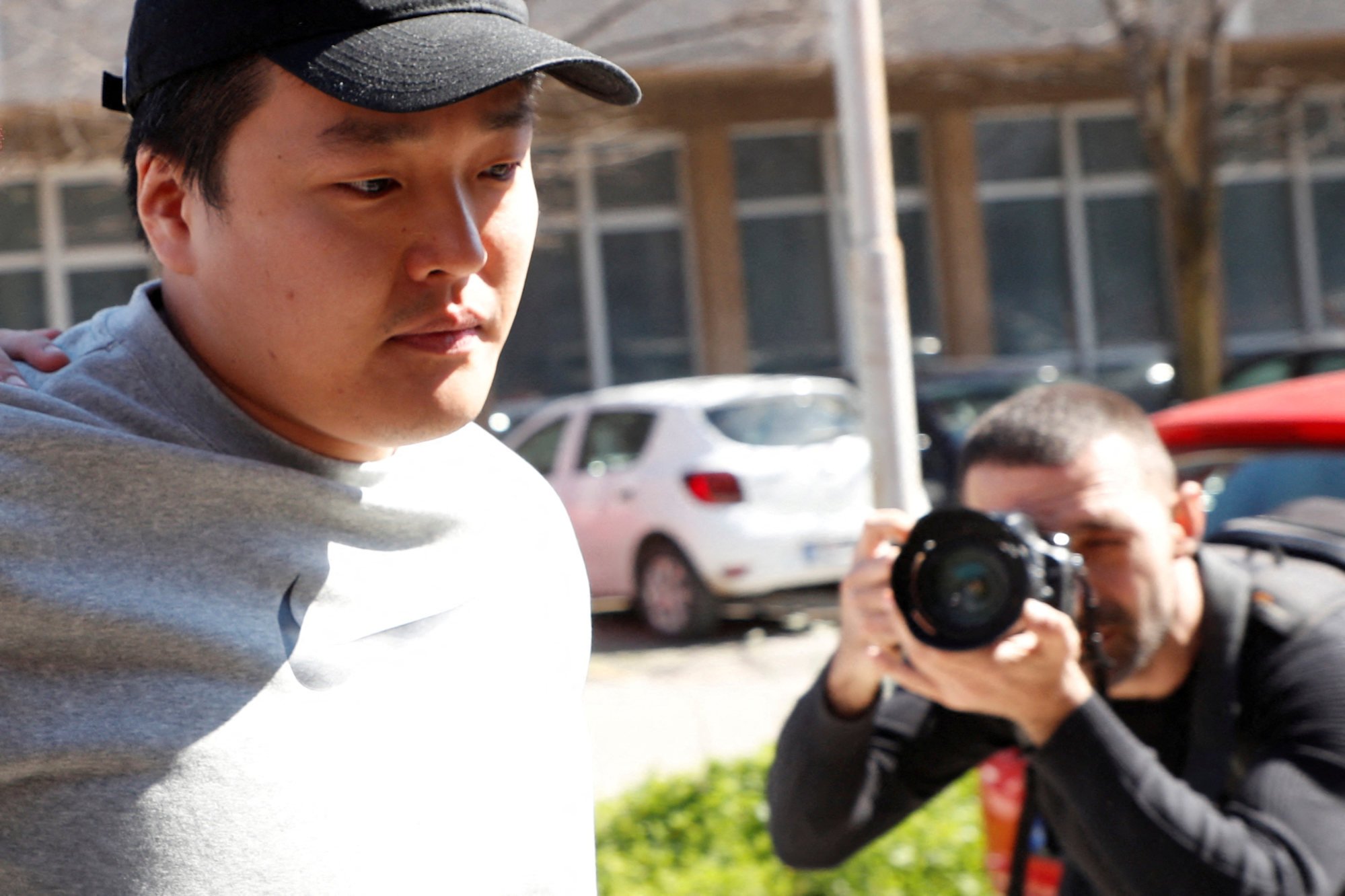 Do Kwon, the cryptocurrency entrepreneur who created the failed Terra stablecoin, is taken to court in handcuffs in Montenegro in March. Photo: Reuters