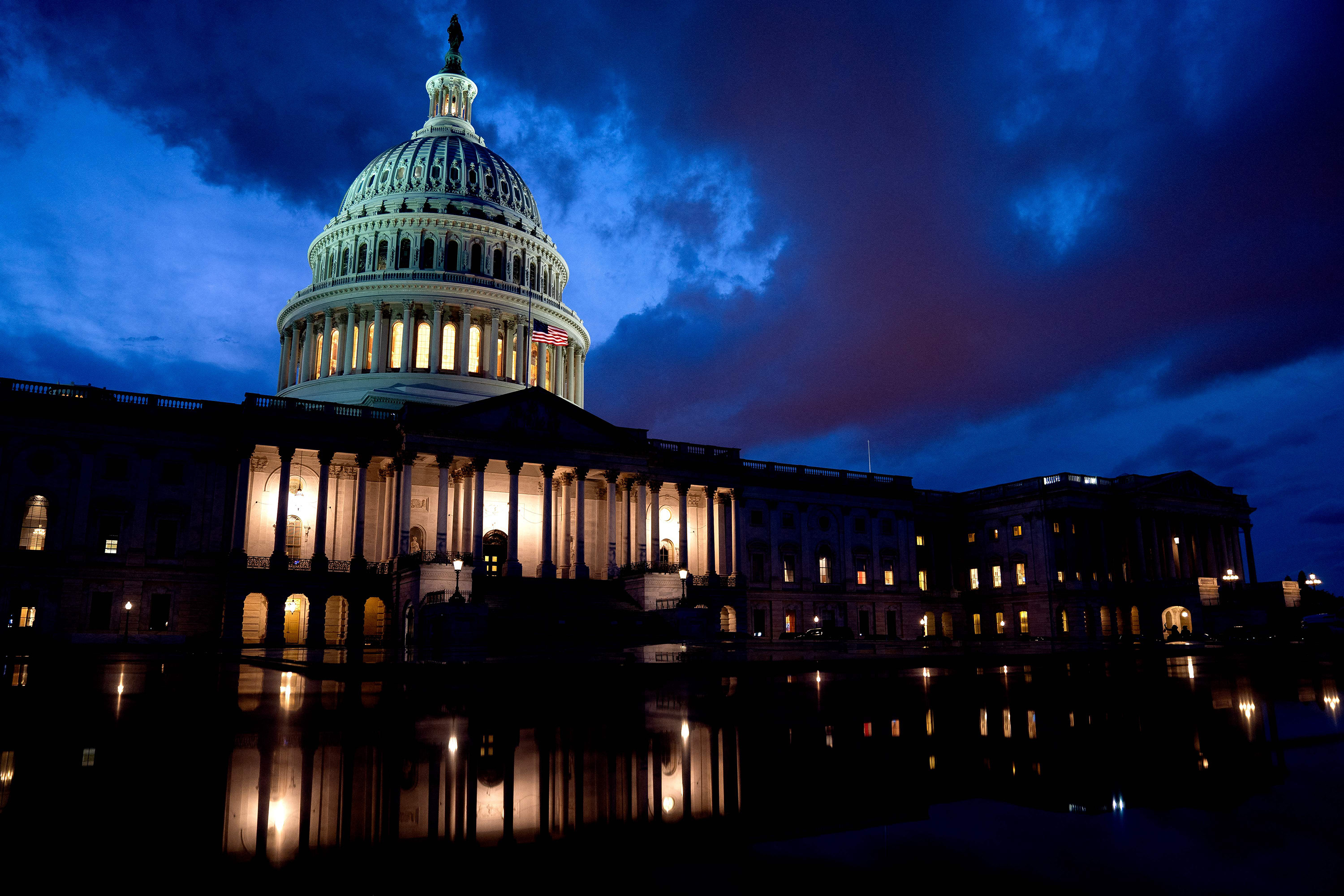 The US Capitol building is seen at night in Washington on August 6. Congress’ perpetual inability to get its financial house in order and repeated dalliances with defaulting on US sovereign debt may well bring a painful reckoning before too long. Photo: TNS