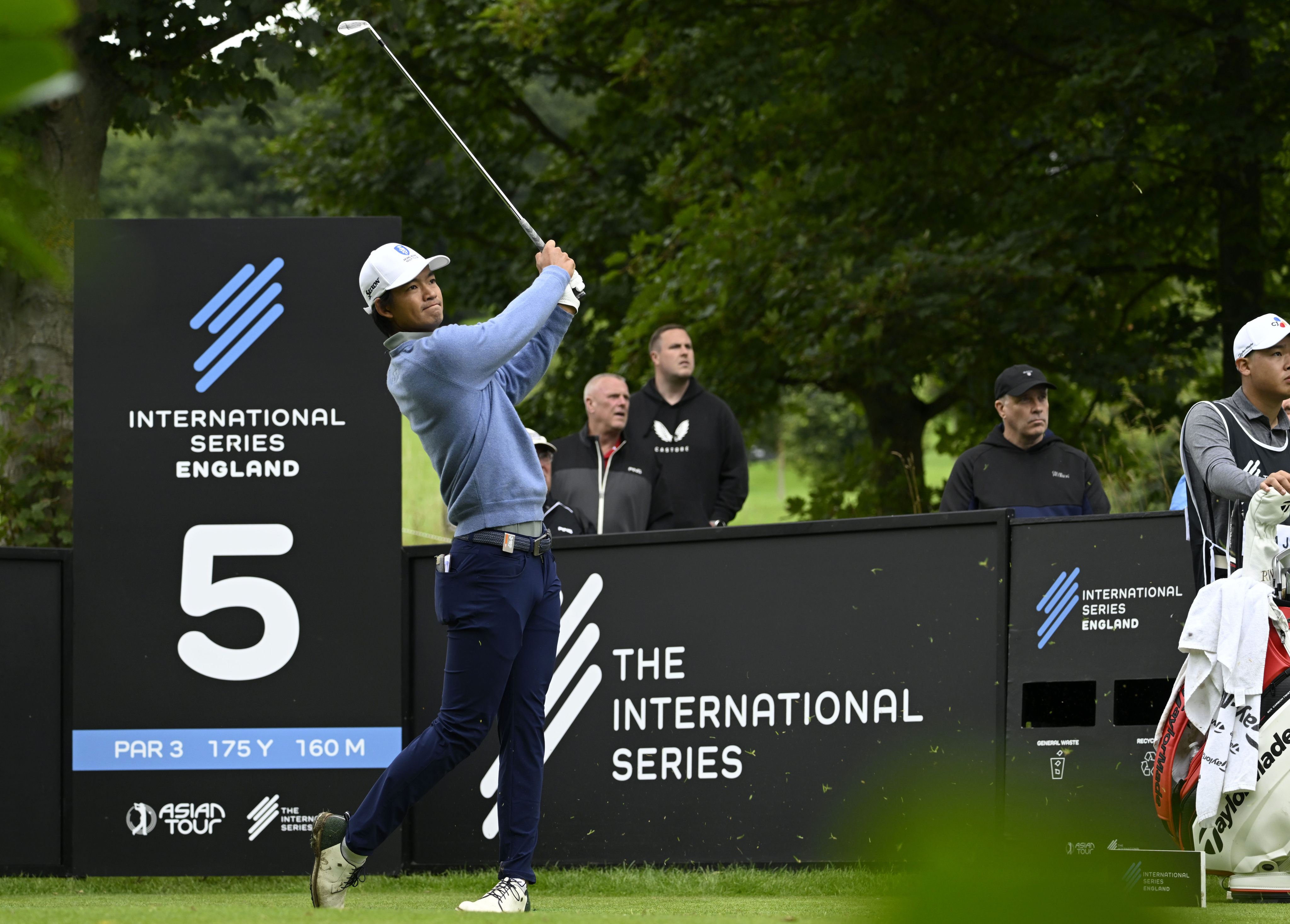 Taichi Kho tees off on the par-3 fifth during the second round of the International Series England. Photo: Asian Tour