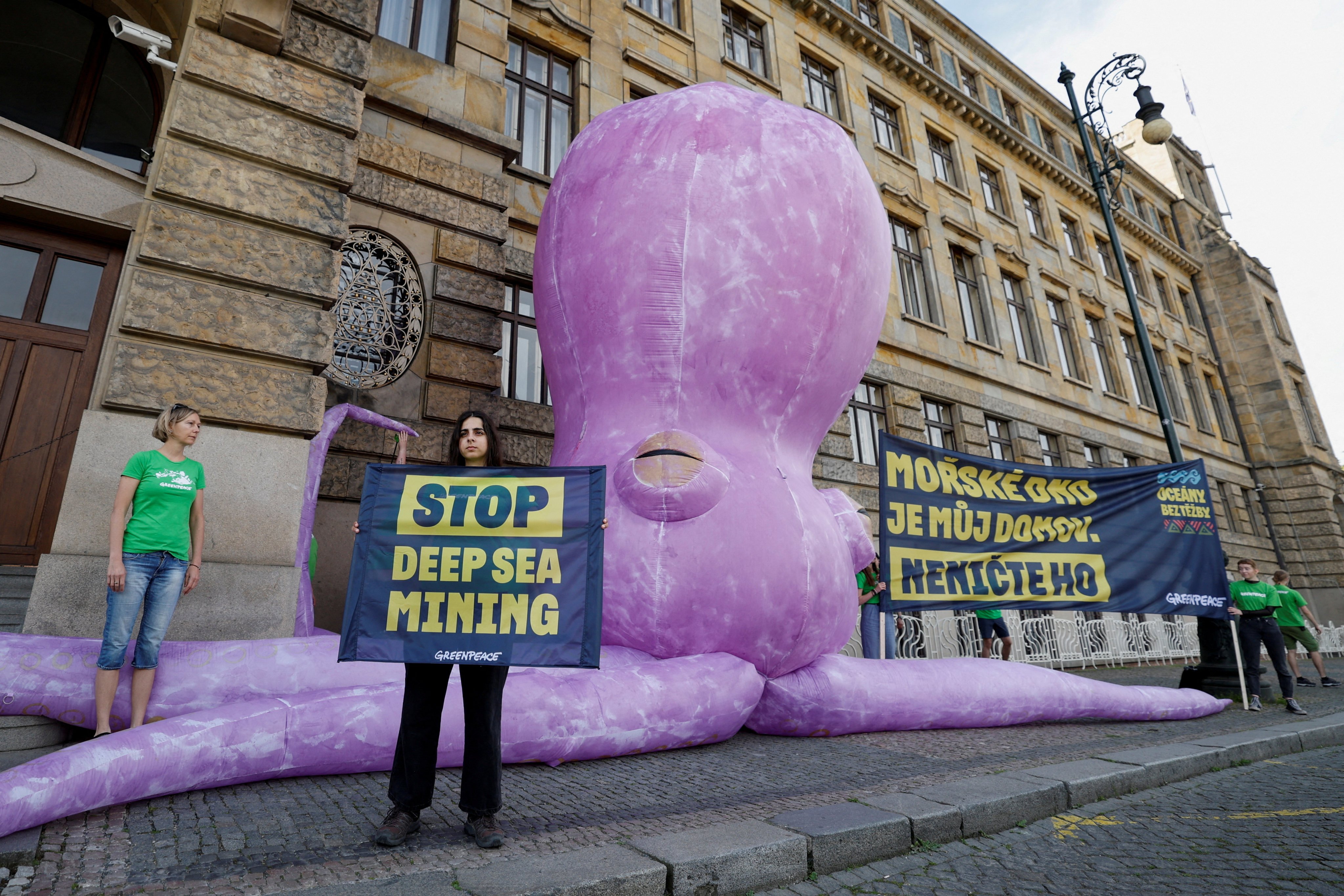 Greenpeace activists hold a protest demanding an end to the push for deep sea mining, in front of the ministry of industry in Prague, Czech Republic, on June 1. Photo: Reuters 