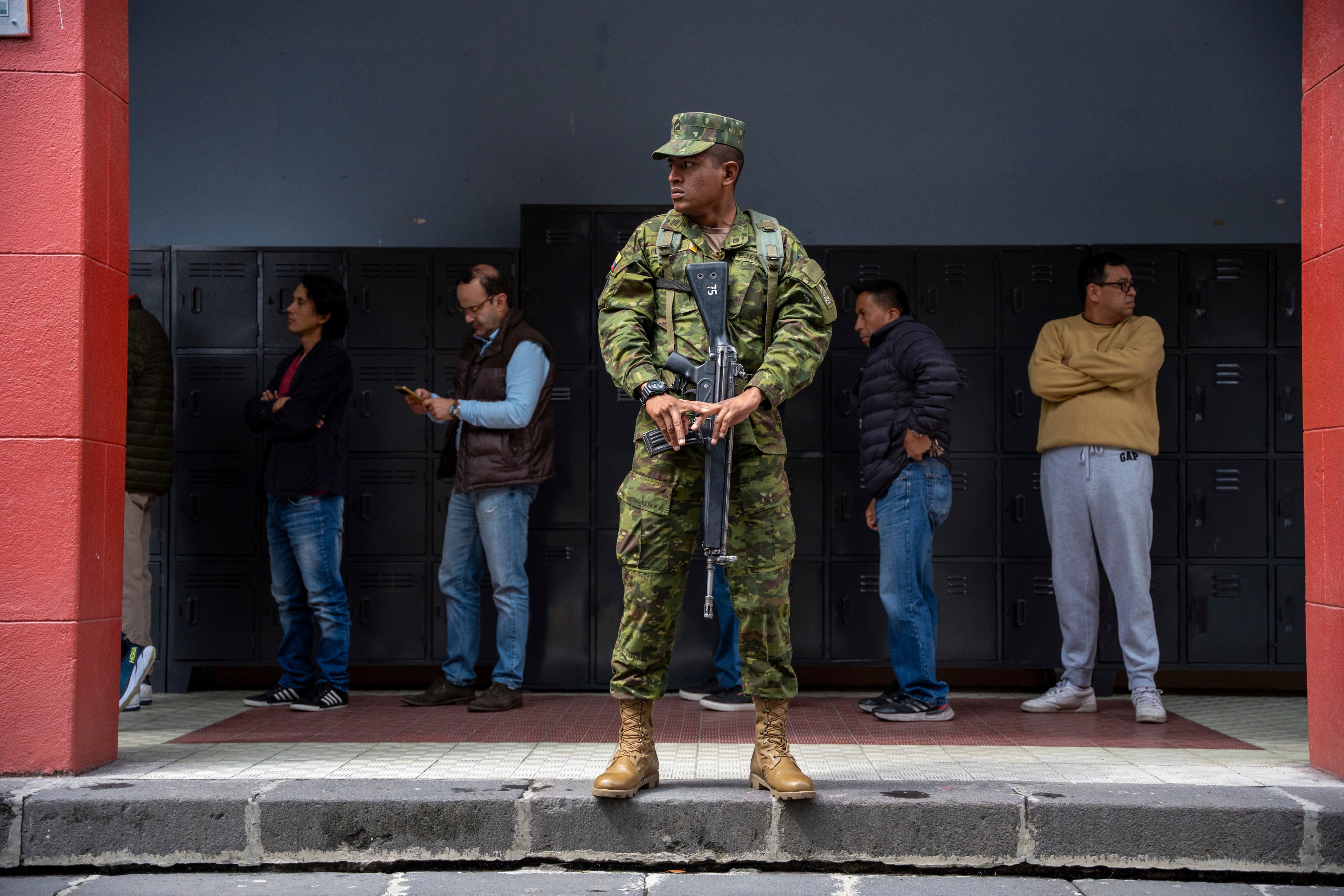 A soldier guards a polling station in Quito, Ecuador. Photo: AP