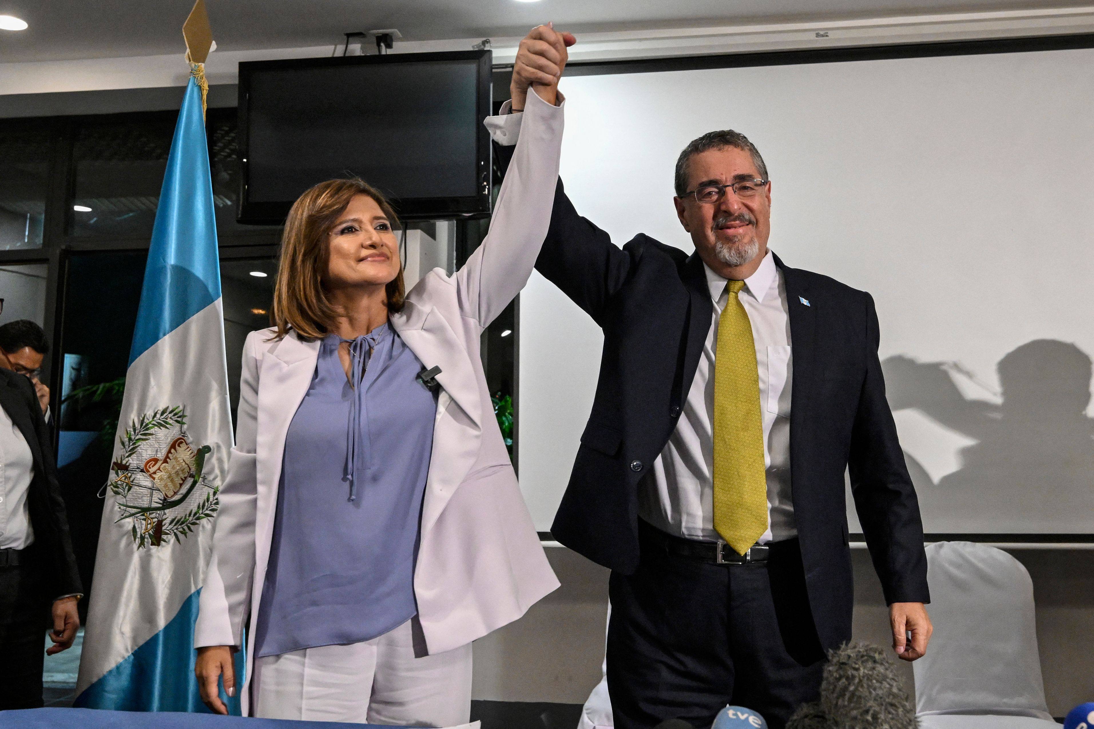 Bernardo Arevalo, and his running mate Karin Herrera celebrate their victor in the Guatemalan presidential election. Photo: AFP