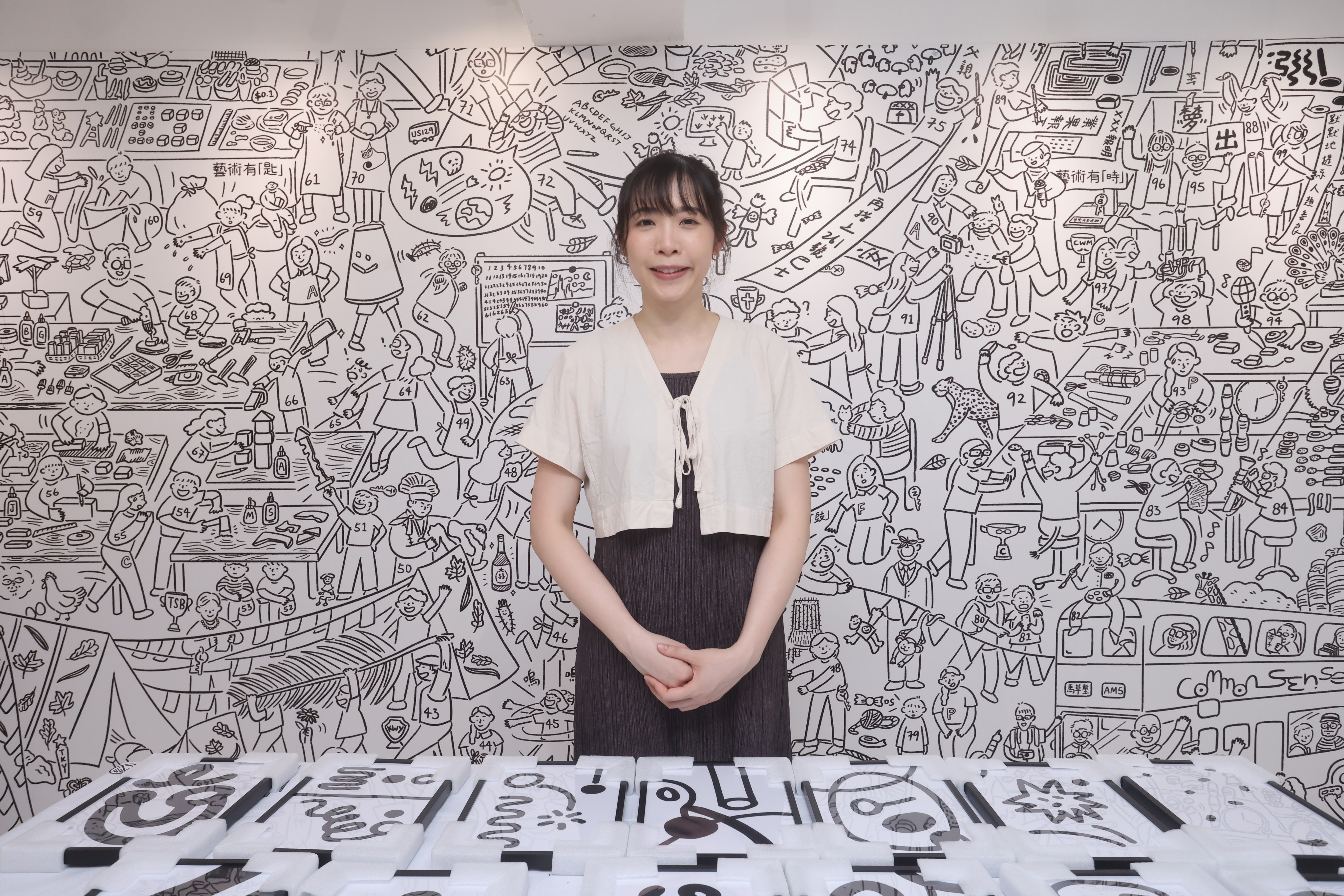 Visual artist Miki Ho Yin-yi at her exhibition “Everybody Studio” at The Bridge+ Living Art Space in Sham Shui Po. Photo: Jonathan Wong