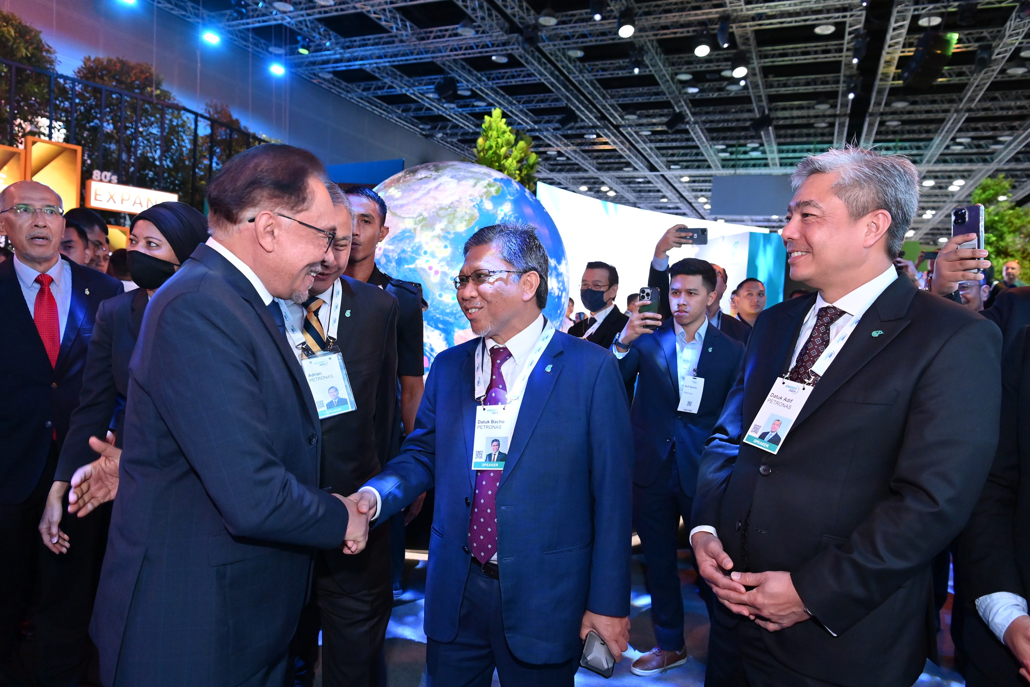 Malaysian Prime Minister Anwar Ibrahim (left) with Datuk Bacho Pilong, senior vice-president of project delivery and technology at Petronas, during a tour of the exhibits at Energy Asia 2023 in Kuala Lumpur.