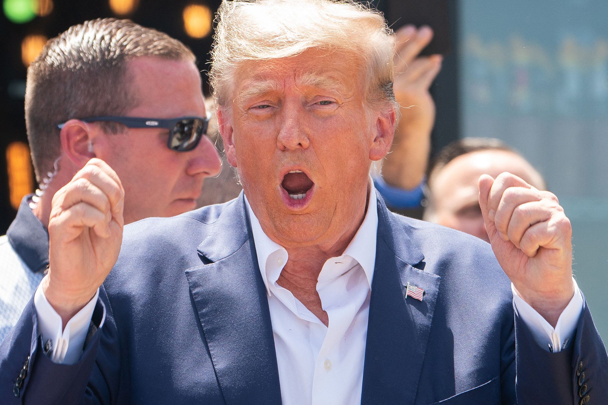 Former US president Donald Trump leaves after speaking at the Iowa State Fair in Des Moines on August 12. Photo: TNS