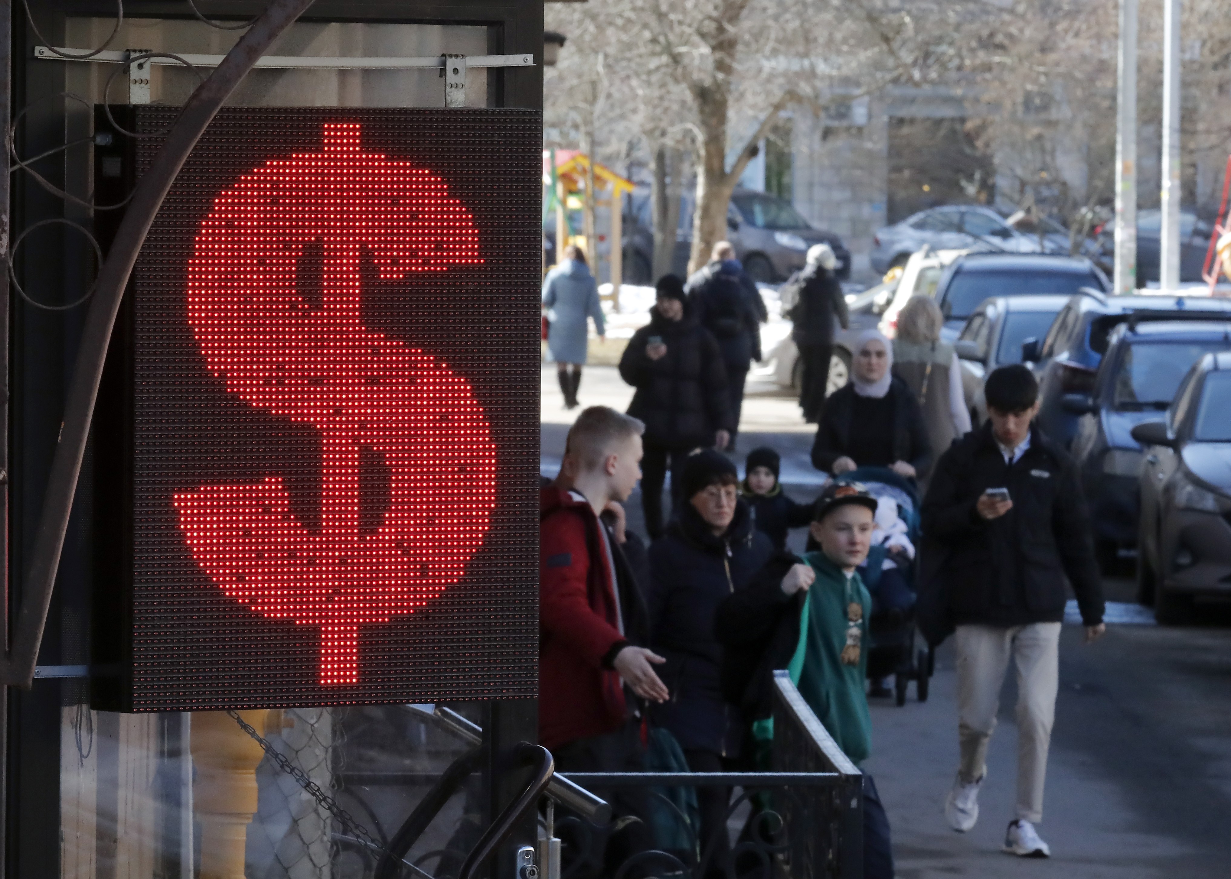 An electronic panel displays a dollar currency sign at an exchange office in St Petersburg, Russia, on April 7. The rouble’s plunge this month caused Russia’s central bank to sharply raise interest rates. Photo: EPA-EFE/