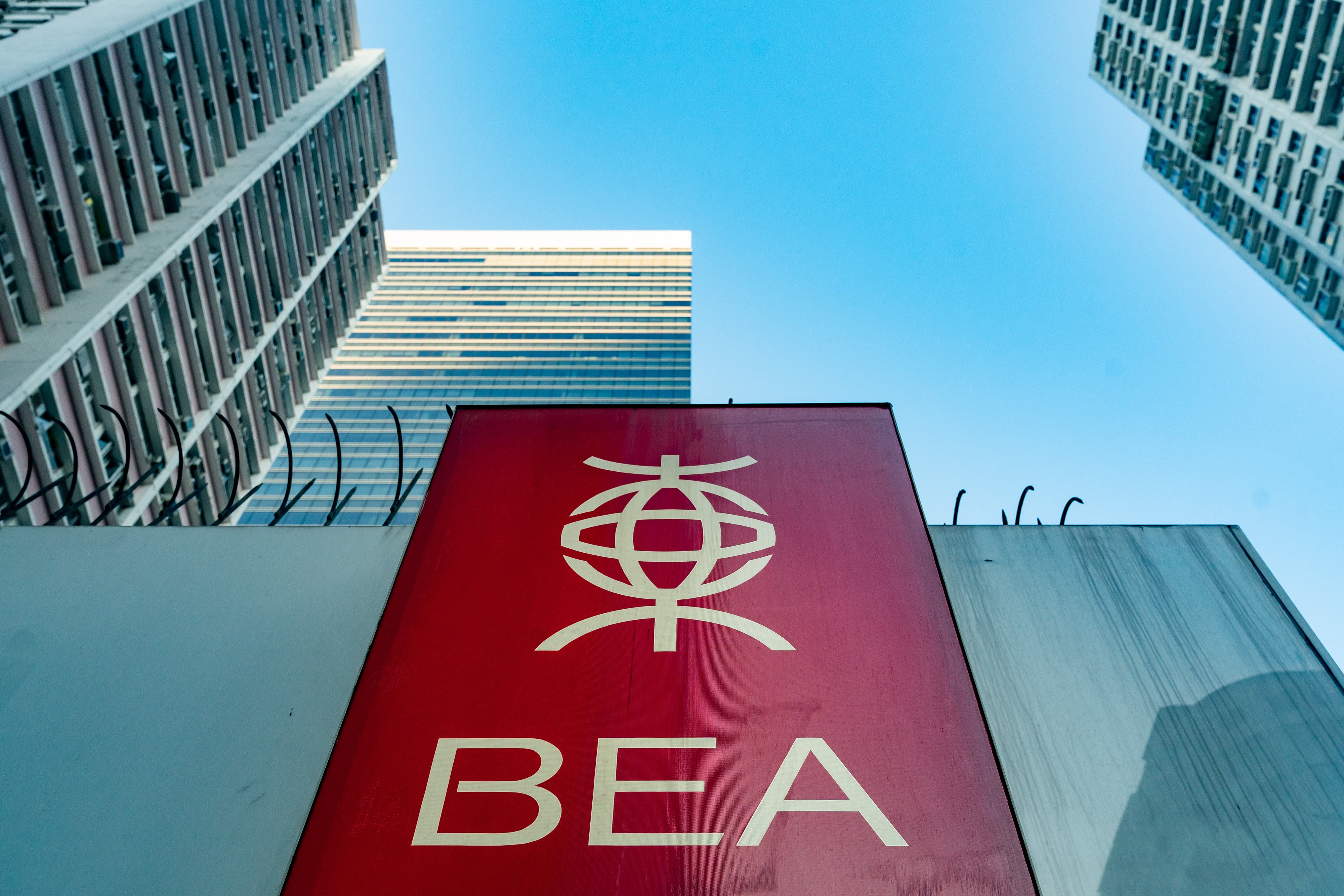 Bank of East Asia said the group faced multiple headwinds and challenges in its business environment in the first half. Photo: Bloomberg