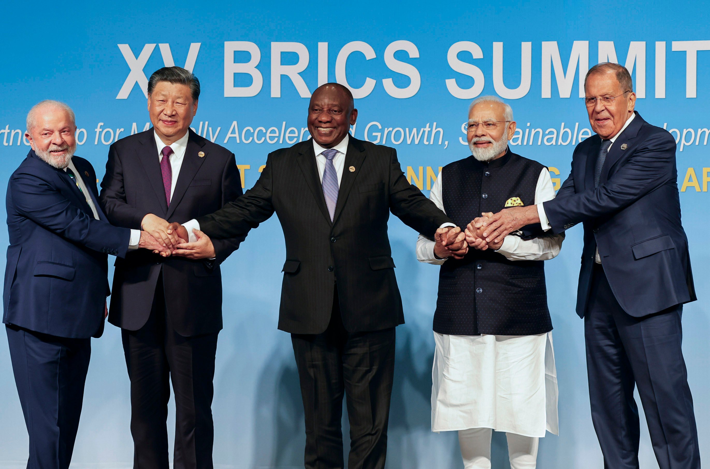 From the left, Brazilian President Luiz Inacio Lula da Silva, Chinese President Xi Jinping, South African President Cyril Ramaphosa, Indian Prime Minister Narendra Modi and Russian Foreign Minister Sergei Lavrov pose for a group photo during the Brics Summit in Johannesburg, South Africa, on August 23. Photo: AP
