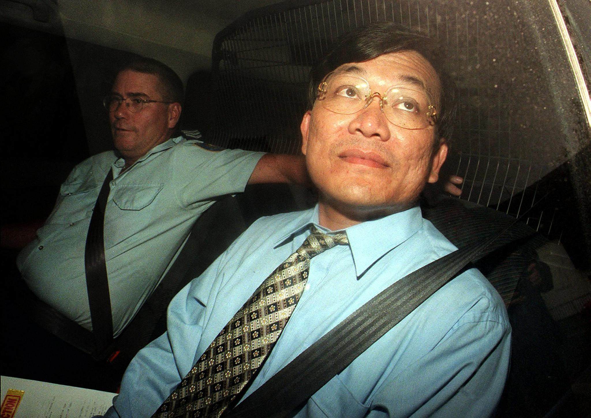 Phuong Canh Ngo leaves Darlinghurst court in Sydney.  Ngo, 42, a local government councillor and aspiring Labor Party parliamentarian, was convicted of murdering MP John Newman. Photo AFP