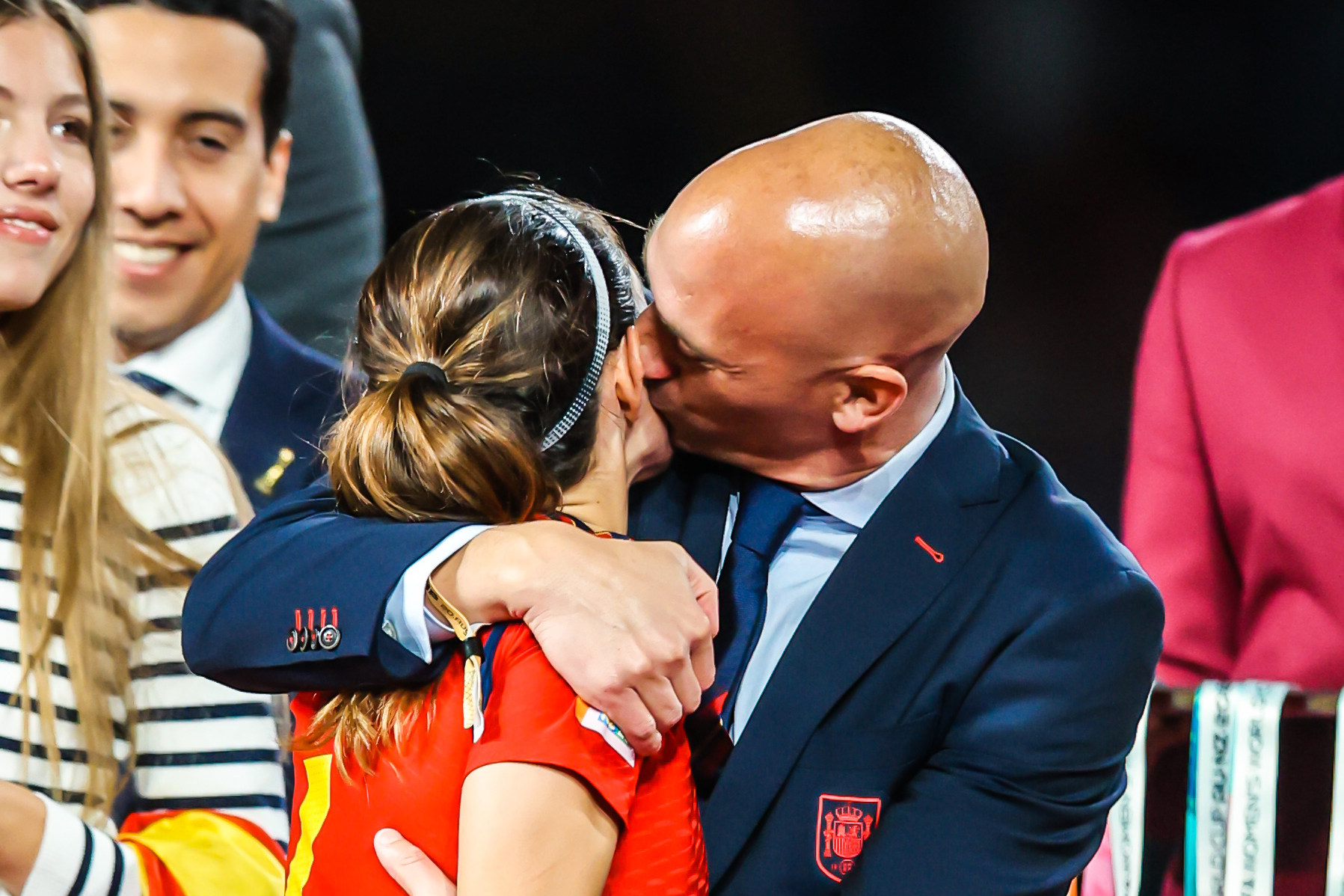 Spanish football federation president Luis Rubiales kisses another Spain player, Aitana Bonmati, after Sunday’s Women’s World Cup final in Sydney. Photo: dpa