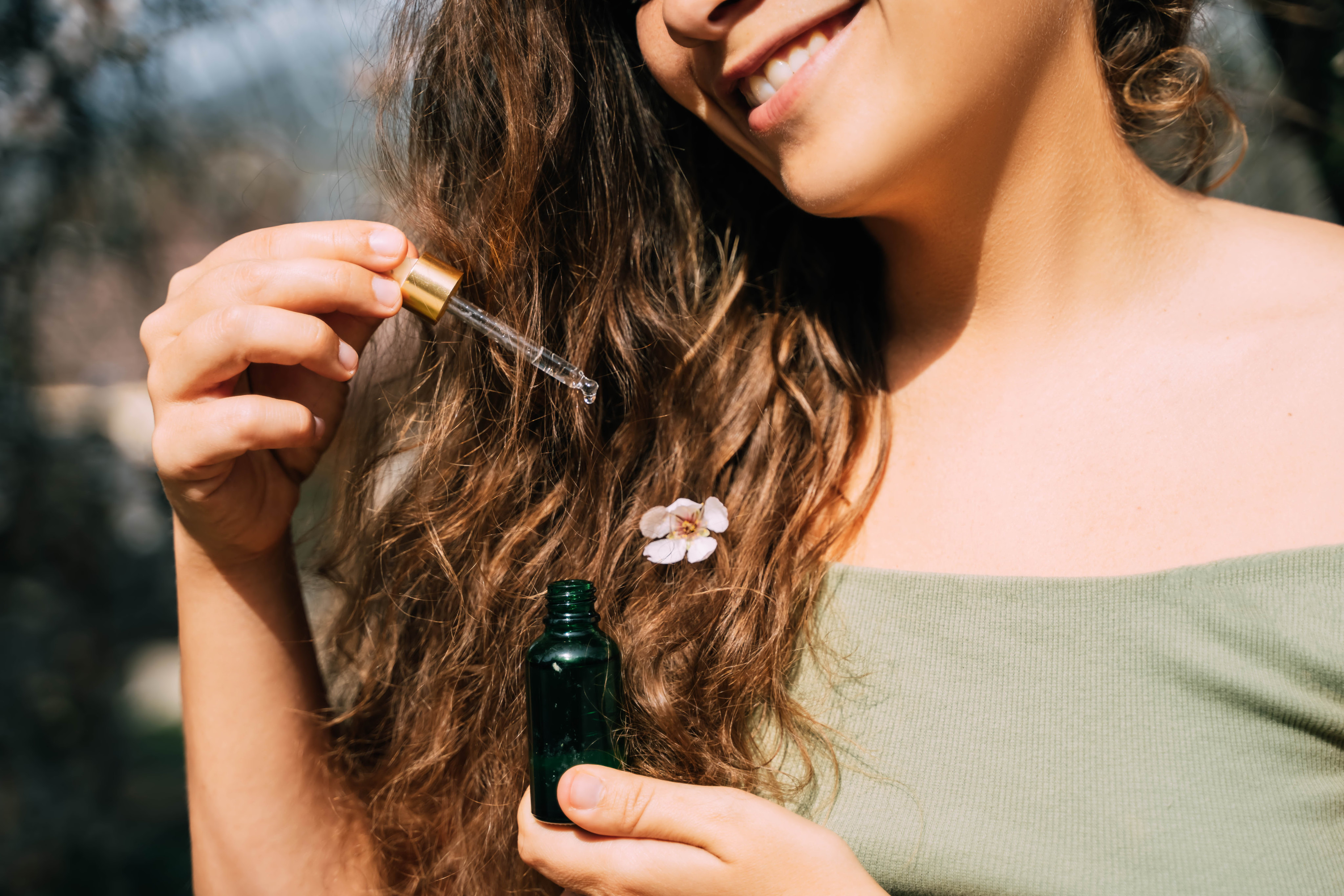 Rosemary oil is a natural solution for at-home haircare. Photo: Getty Images