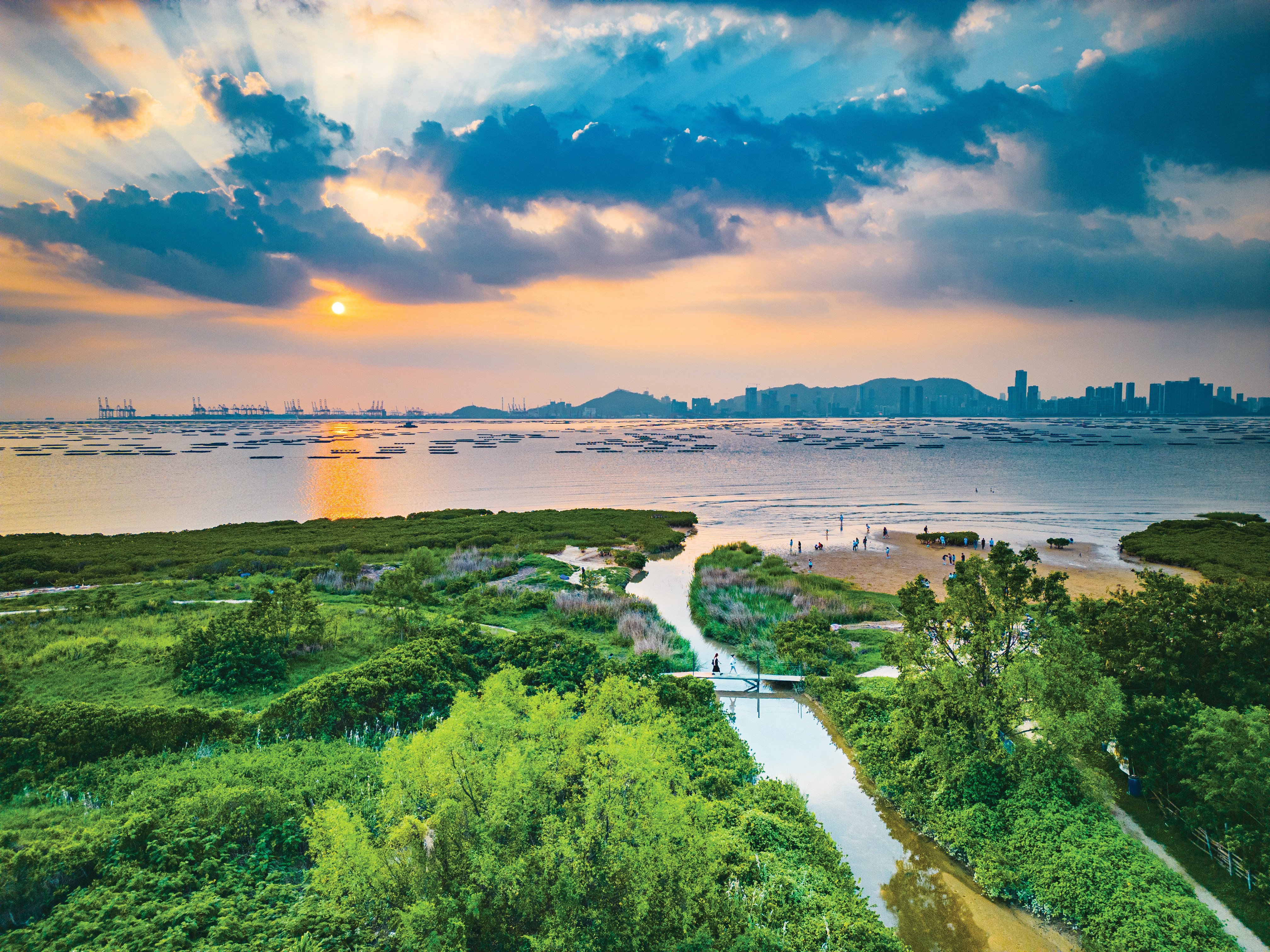 A dramatic sunset above Pak Nai in Hong Kong’s northwestern New Territories, looking out across Deep Bay towards the mainland Chinese city of Shenzhen.

