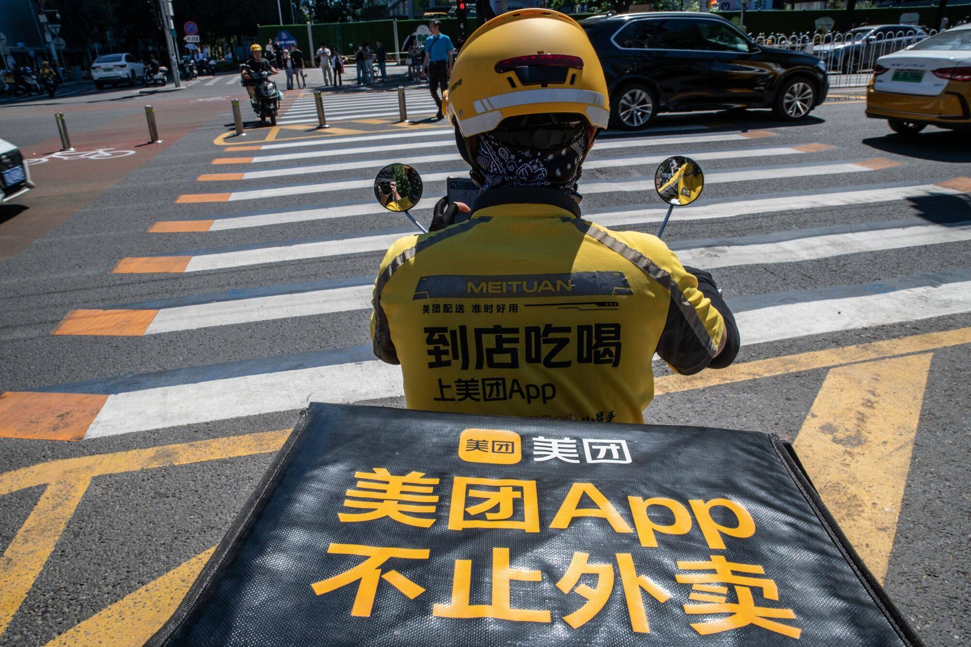 A food delivery courier for Meituan in Beijing. Photo: Bloomberg