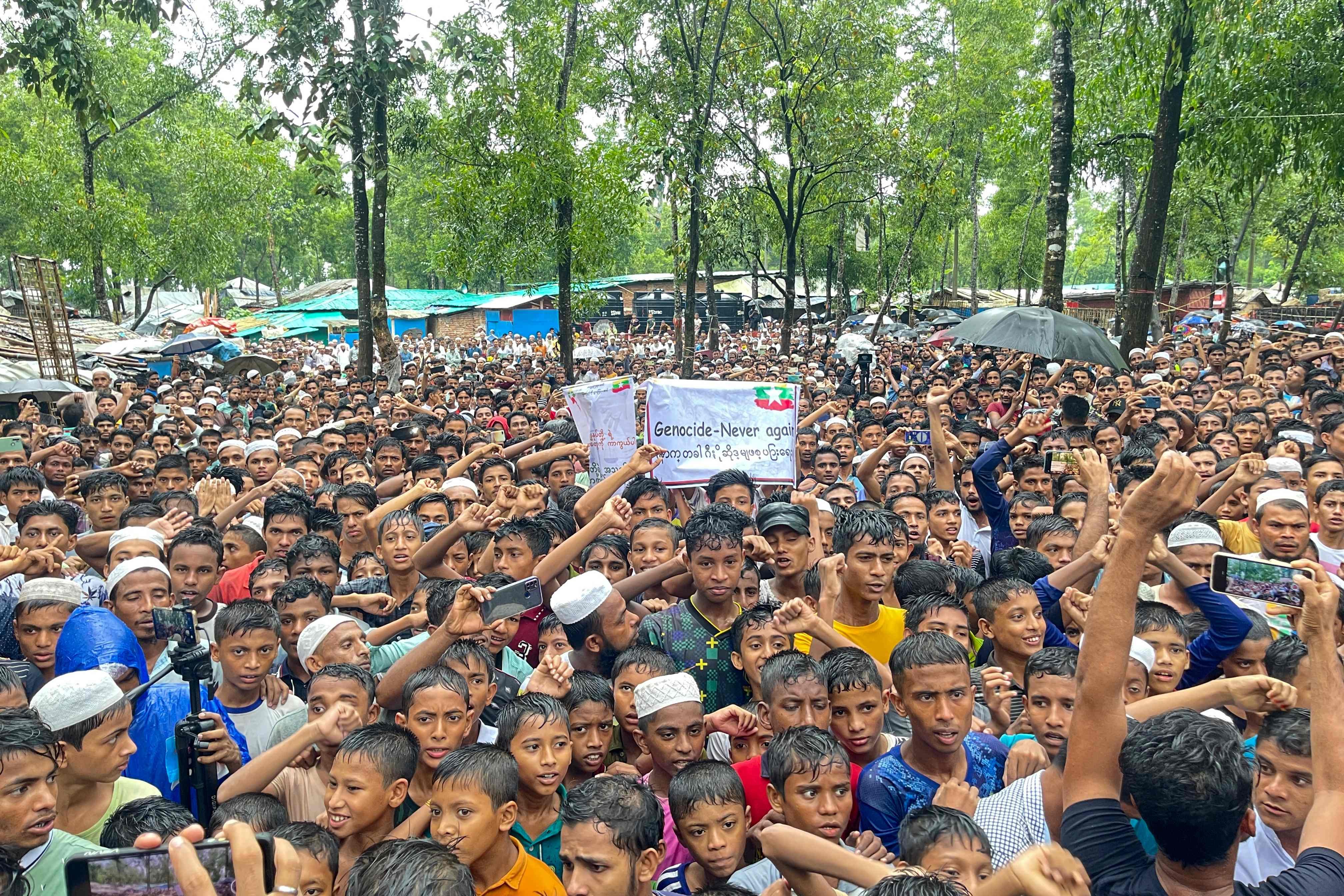 Rohingya refugees gather for a rally marking the 6th anniversary of “genocide day”, demanding their secured and dignified return to Myanmar. Photo: AFP