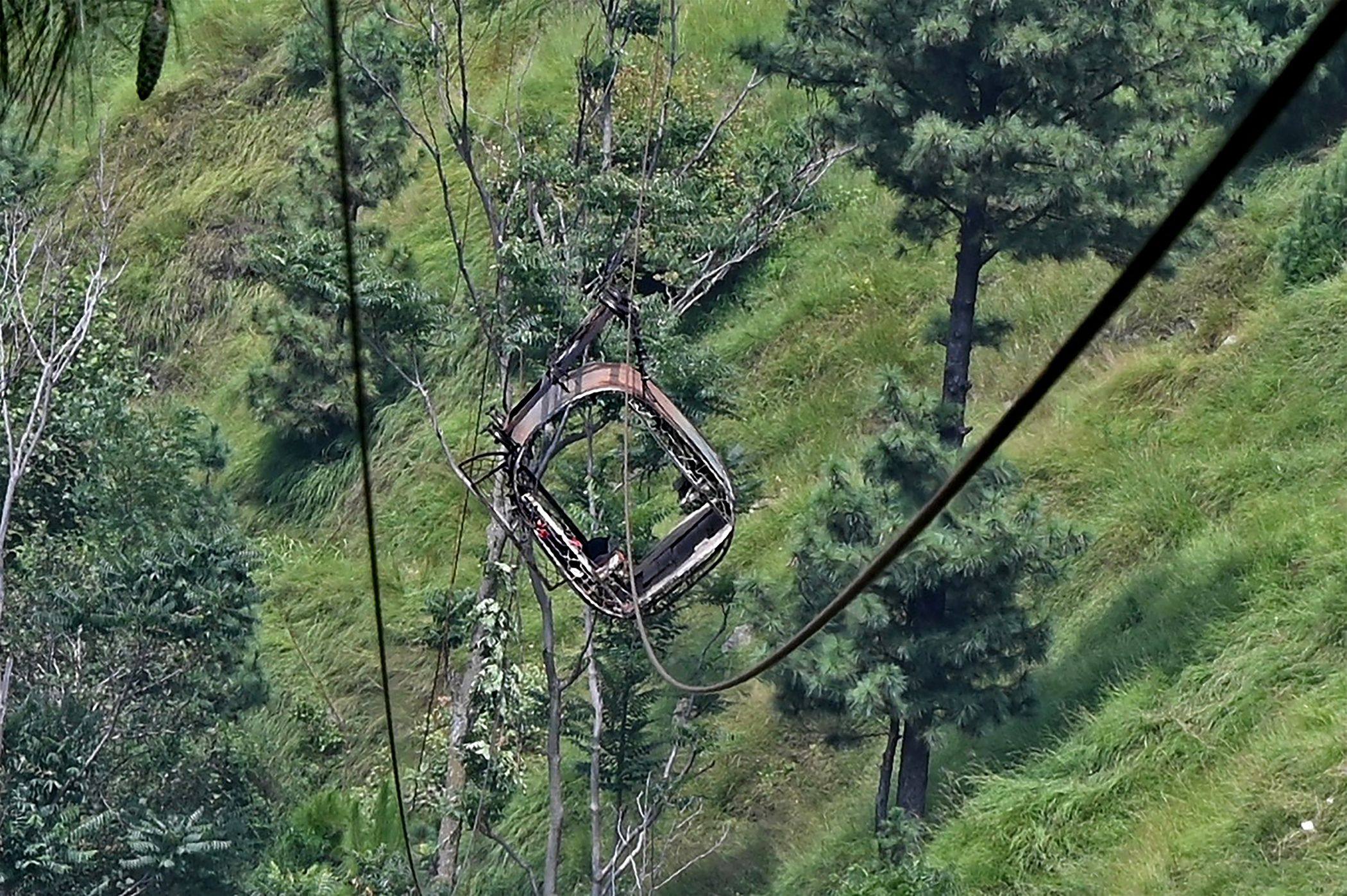 A view of the chairlift cable car in the Pashto village of Khyber Pakhtunkhwa province, Pakistan on Wednesday, a day after it broke sending passengers plunging into a ravine. Photo: AFP