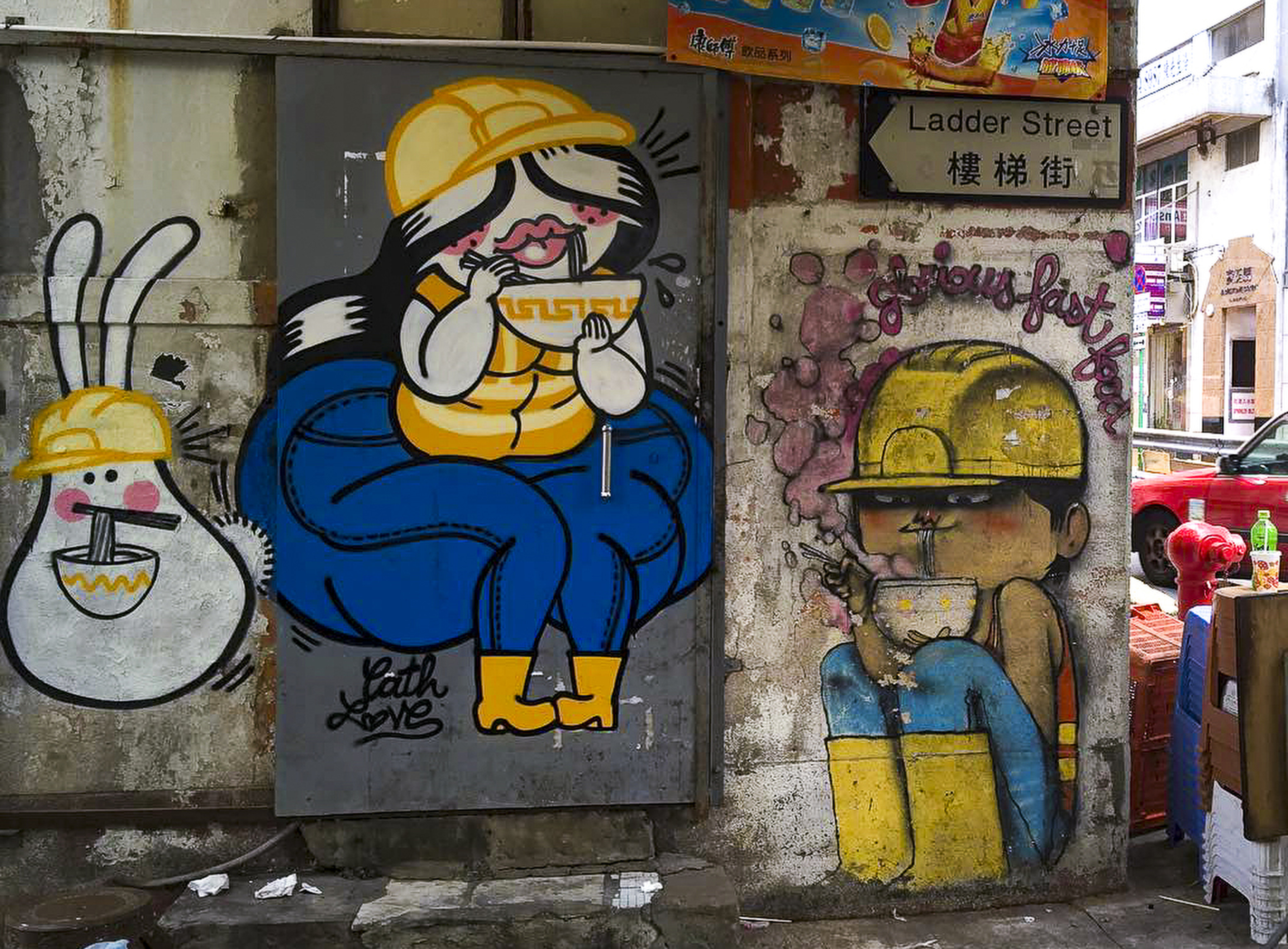 The artwork showing construction workers wearing yellow helmets was put up in 2011. Photo: Handout 