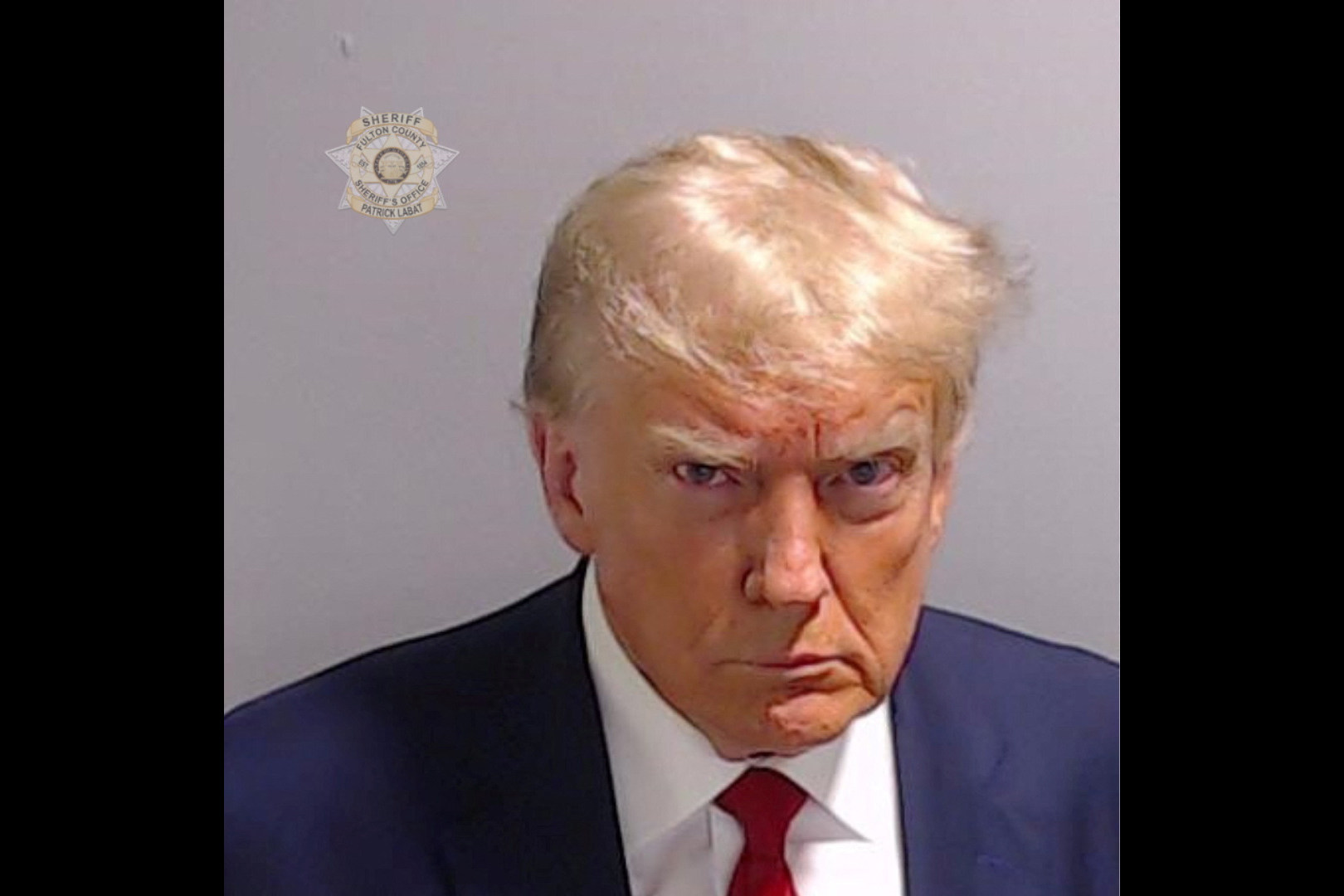 Donald Trump in a police booking mugshot released by the Fulton County Sheriff’s Office. Photo: Reuters