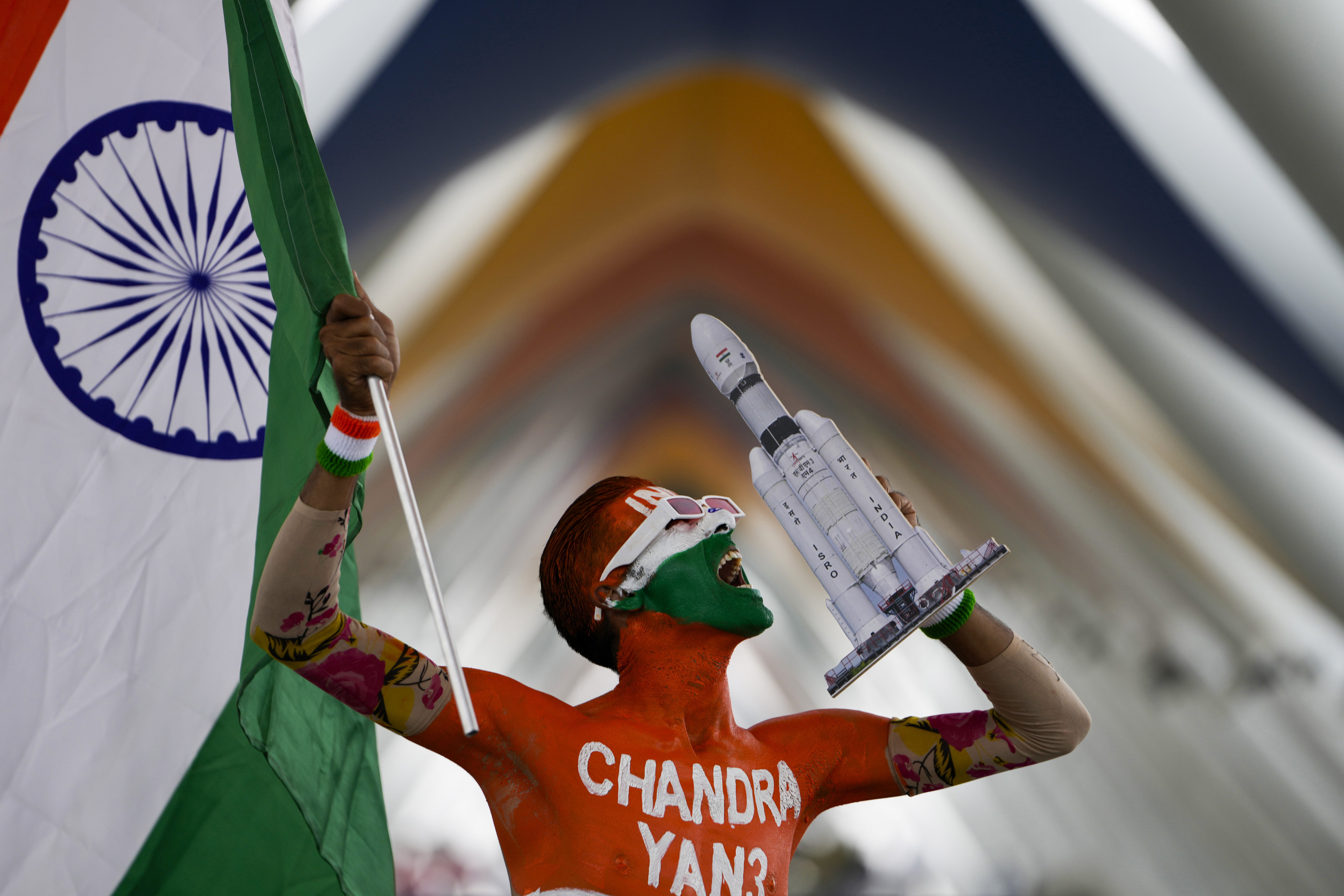 A man cheers for India’s moon mission in Ahmedabad, India, on August 22. Photo: AP 