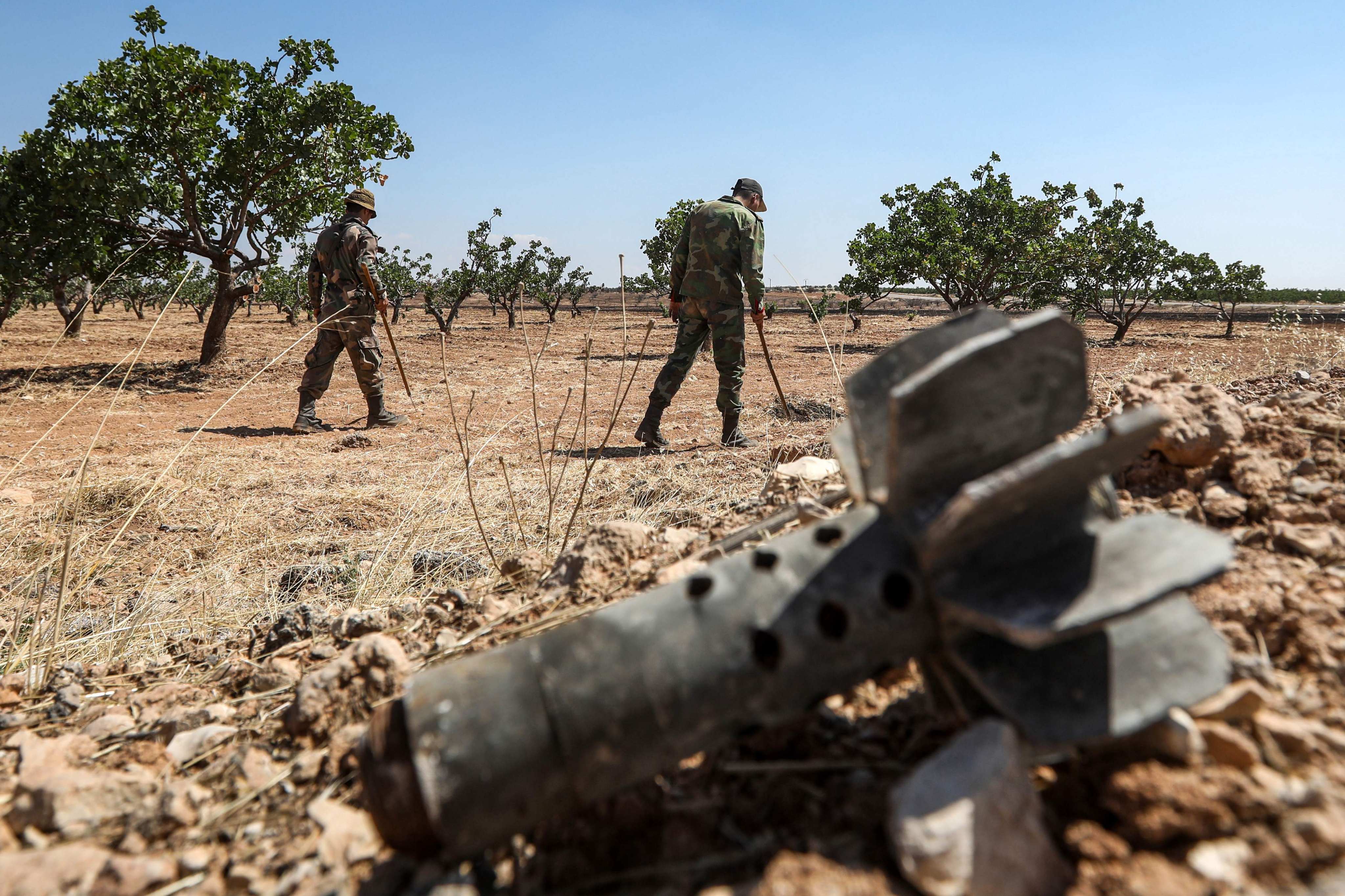 Syrian soldiers searching for landmines. Photo: AFP