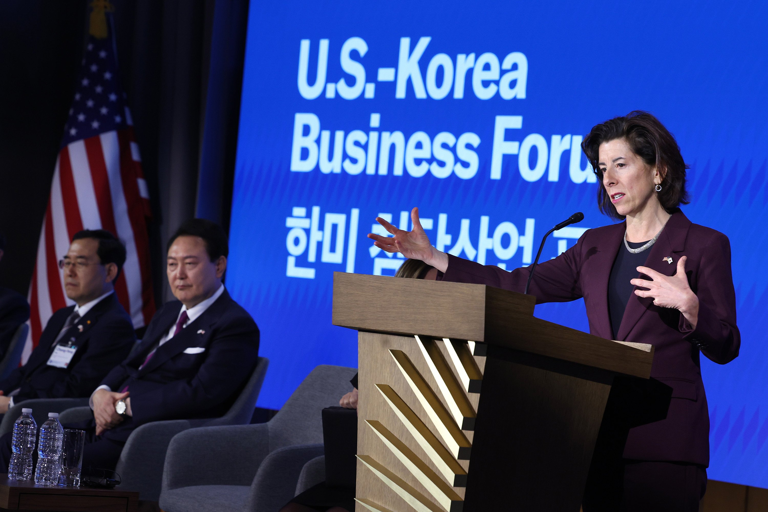 US Commerce Secretary Gina Raimondo delivers remarks alongside South Korean President Yoon Suk-yeol during a US-Korea Business Forum at the US Chamber of Commerce in Washington on April 25. Photo: TNS
