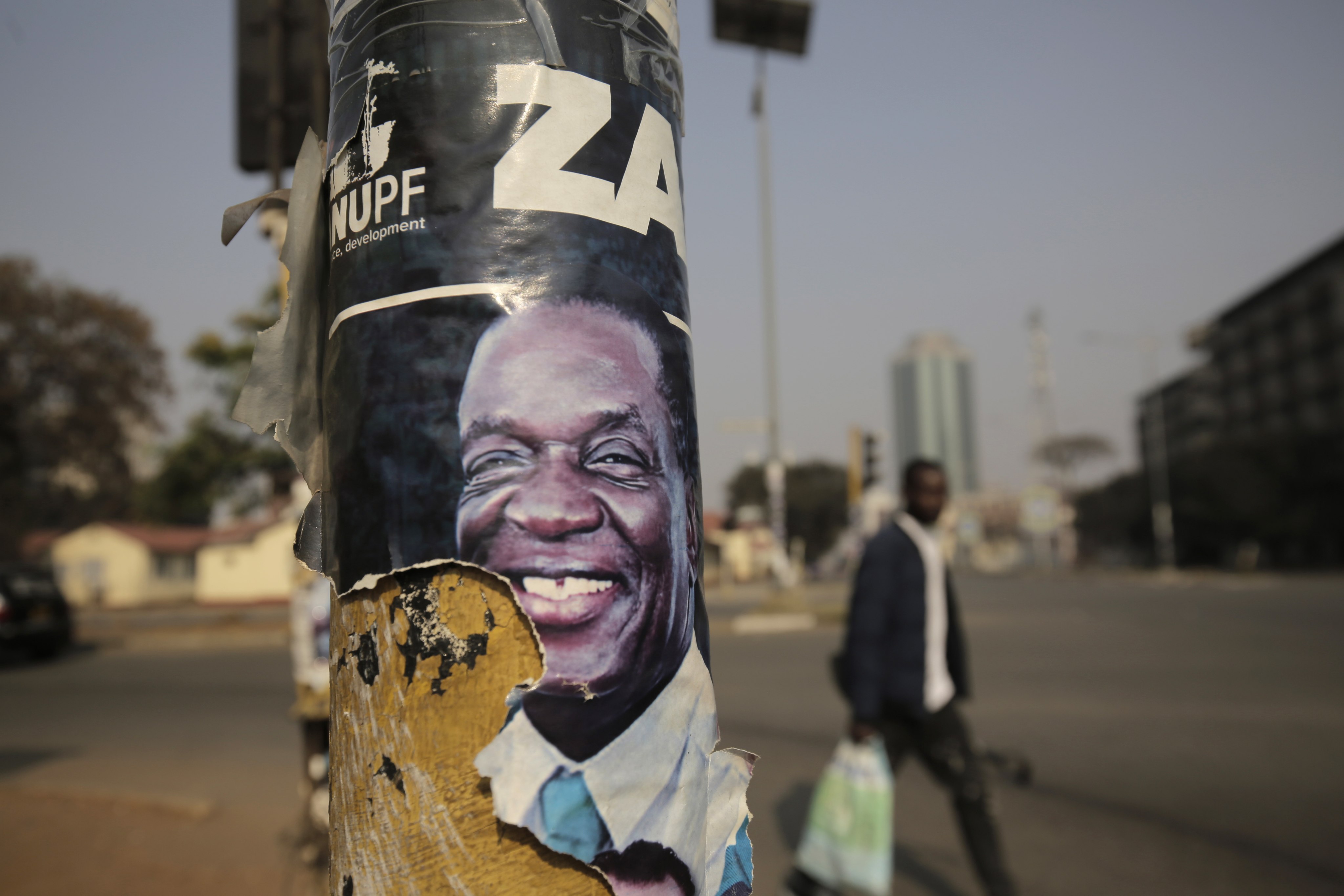 An election poster of Zimbabwe’s President Emmerson Mnangagwa in Harare, Zimbabwe. Photo: EPA-EFE
