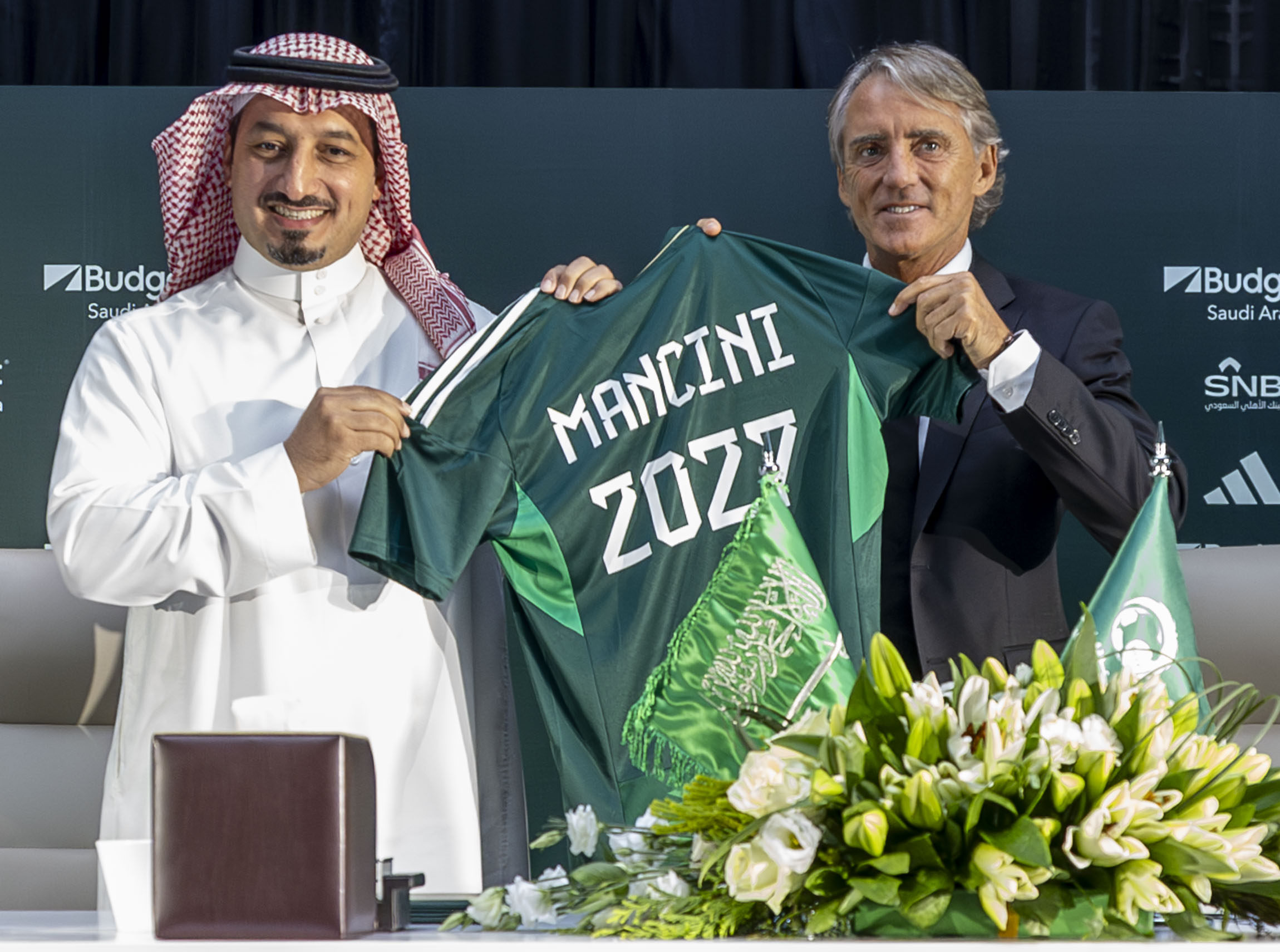 New Saudi Arabia boss Roberto Mancini (right) flanked by Saudi Arabian Football Federation President Yasser Al Misehal at a press conference in Riyadh. Photo: Handout