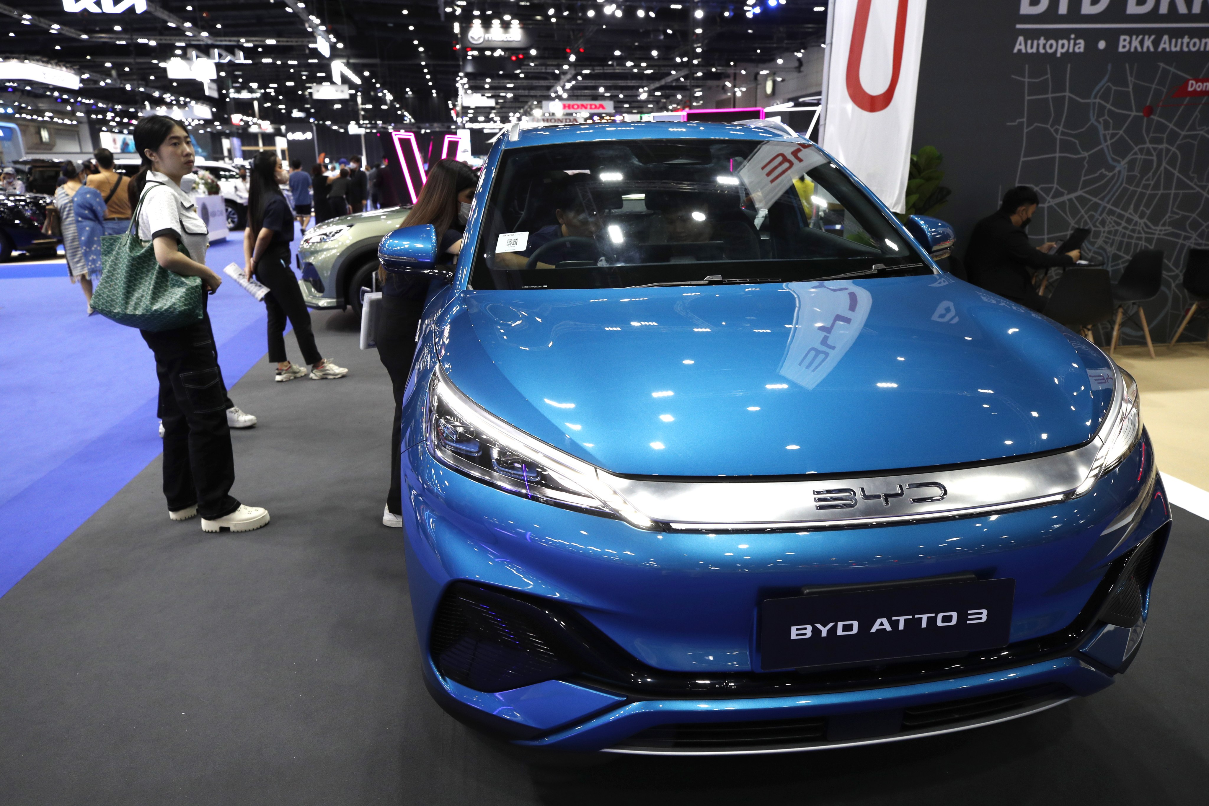 Visitors look at BYD’s ATTO 3 electric car at the Big 2023 Motor Sale trade event in Bangkok, on Monday. Photo: EPA-EFE