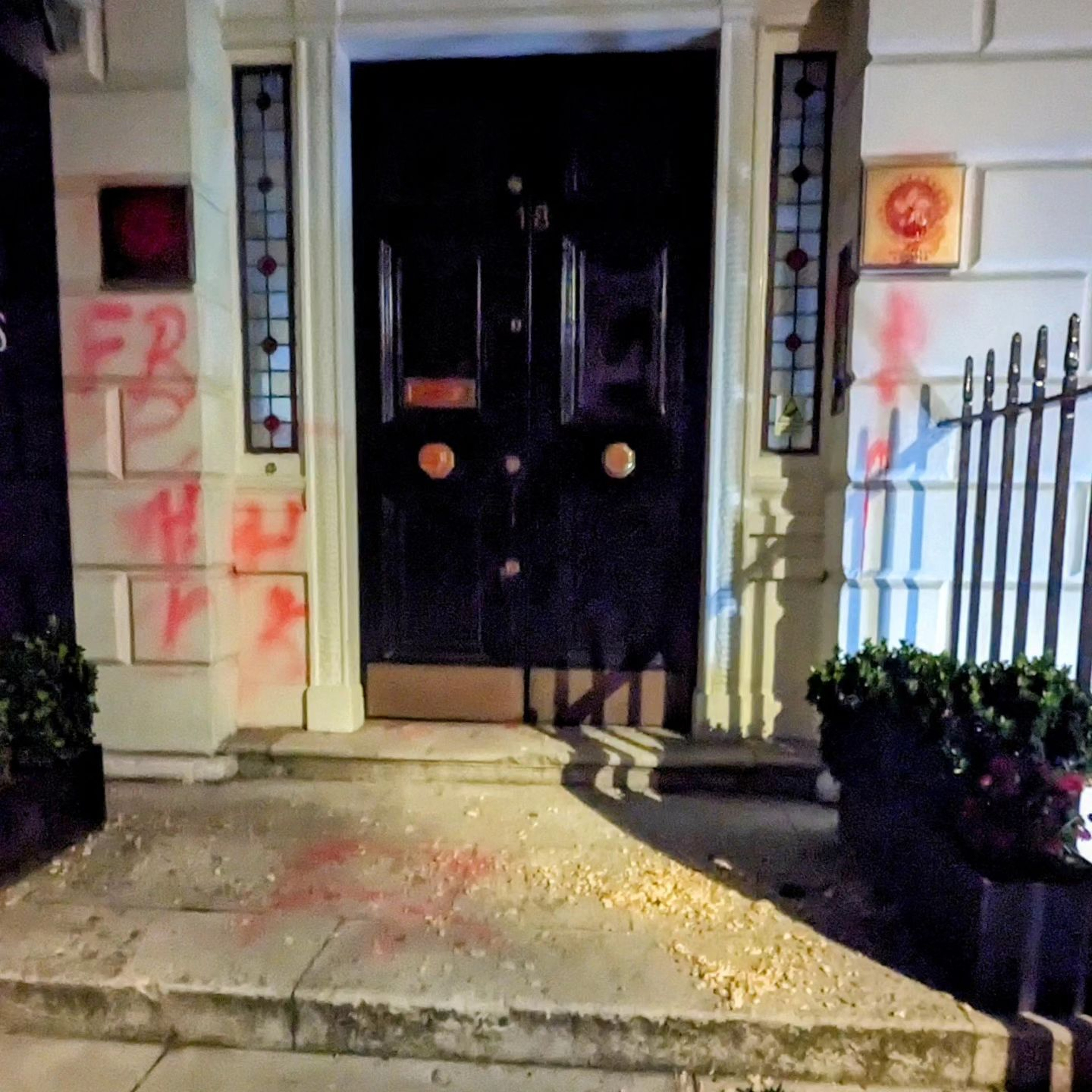 The damage done by vandals to the entrance of the Hong Kong economic and trade office in London, which has been condemned by the government. Photo: SCMP