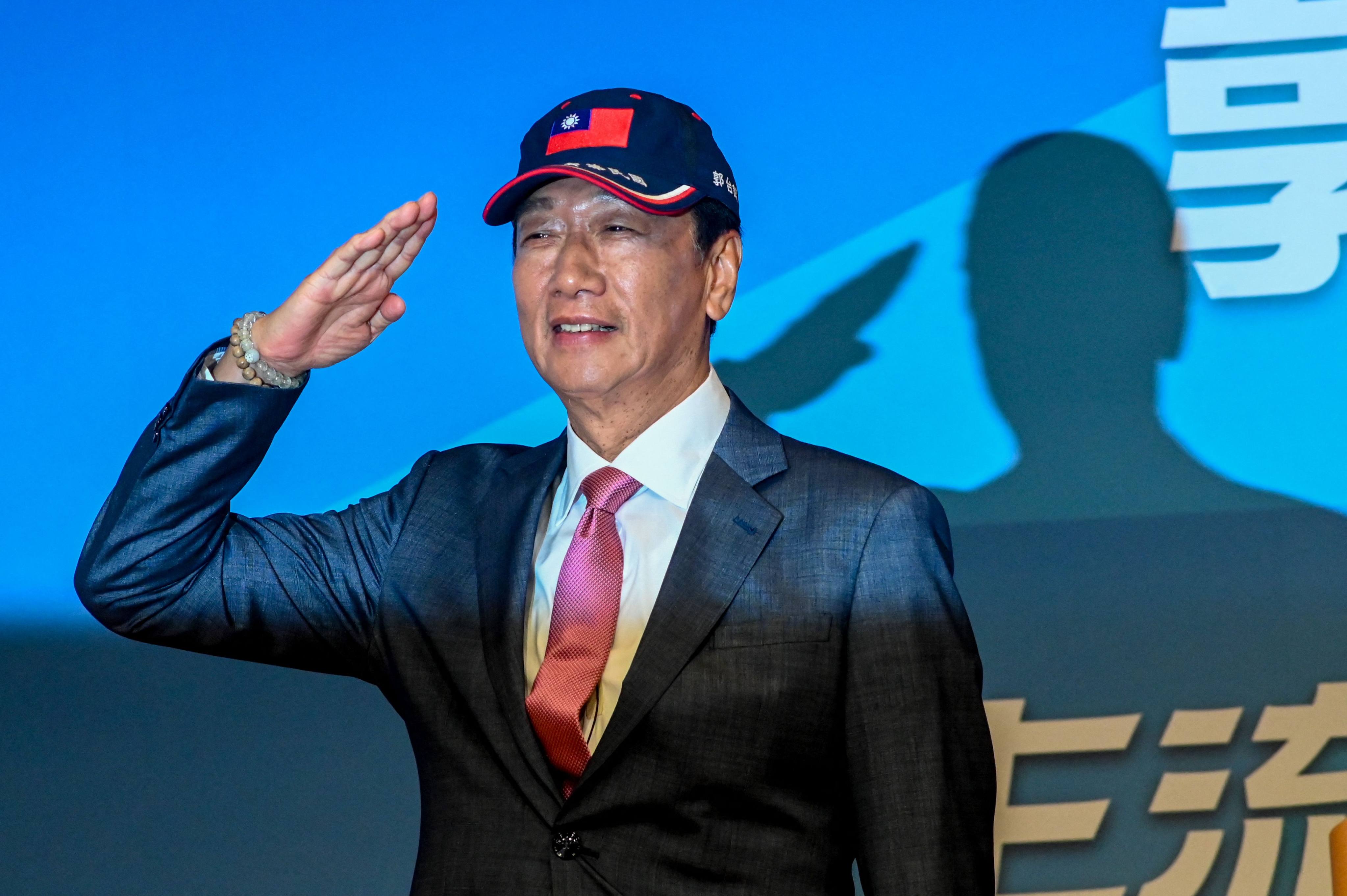 Former Foxconn Founder Terry Gou salutes during a press conference in Taipei on August 28, 2023. Gou announced that he will run for president of Taiwan as an independent candidate. Photo: AFP