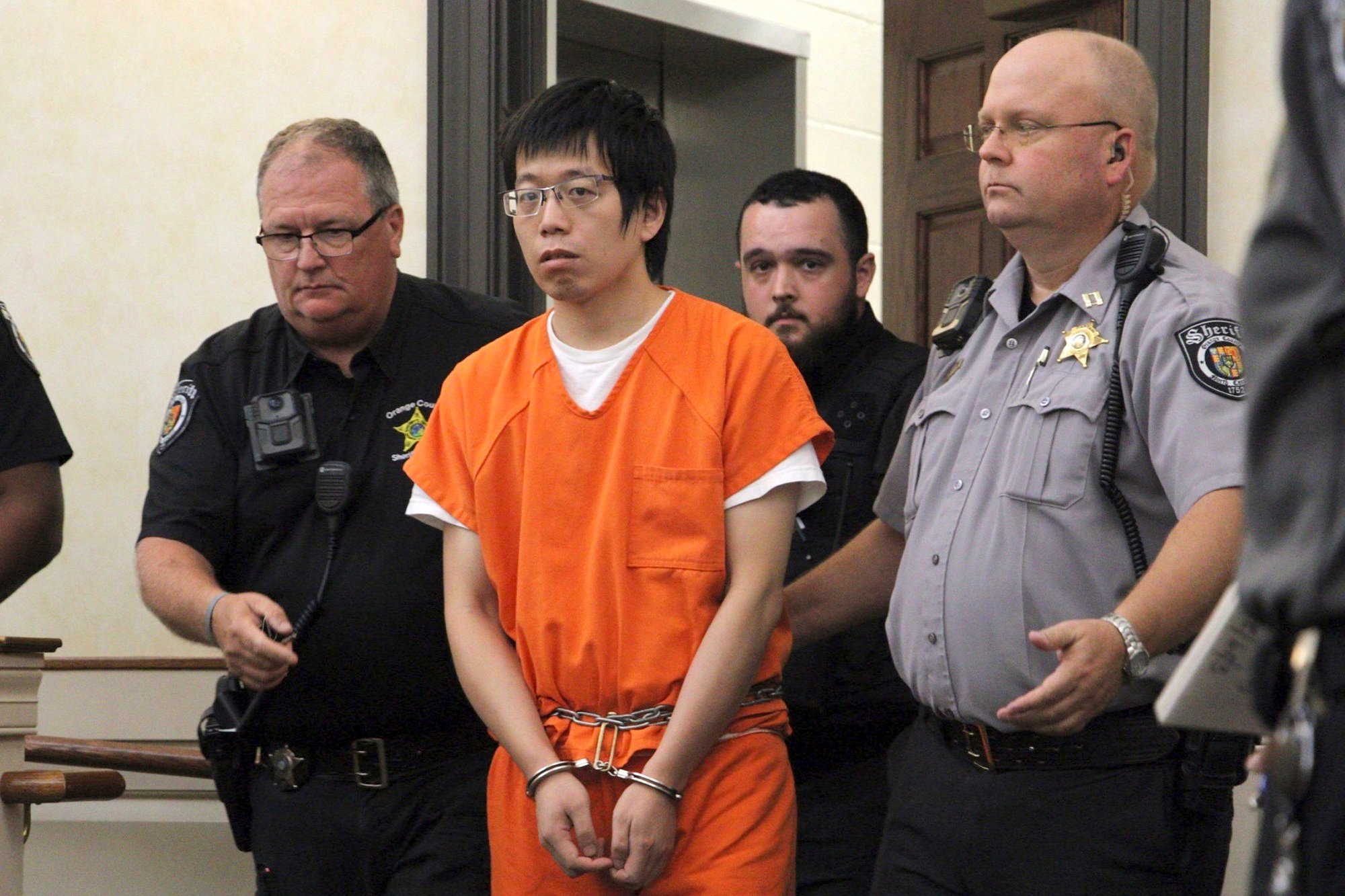 Tailei Qi, charged in the fatal shooting of a University of North Carolina at Chapel Hill faculty member, appears at the Orange County Courthouse in Hillsborough, North Carolina, on Tuesday. Photo: AP