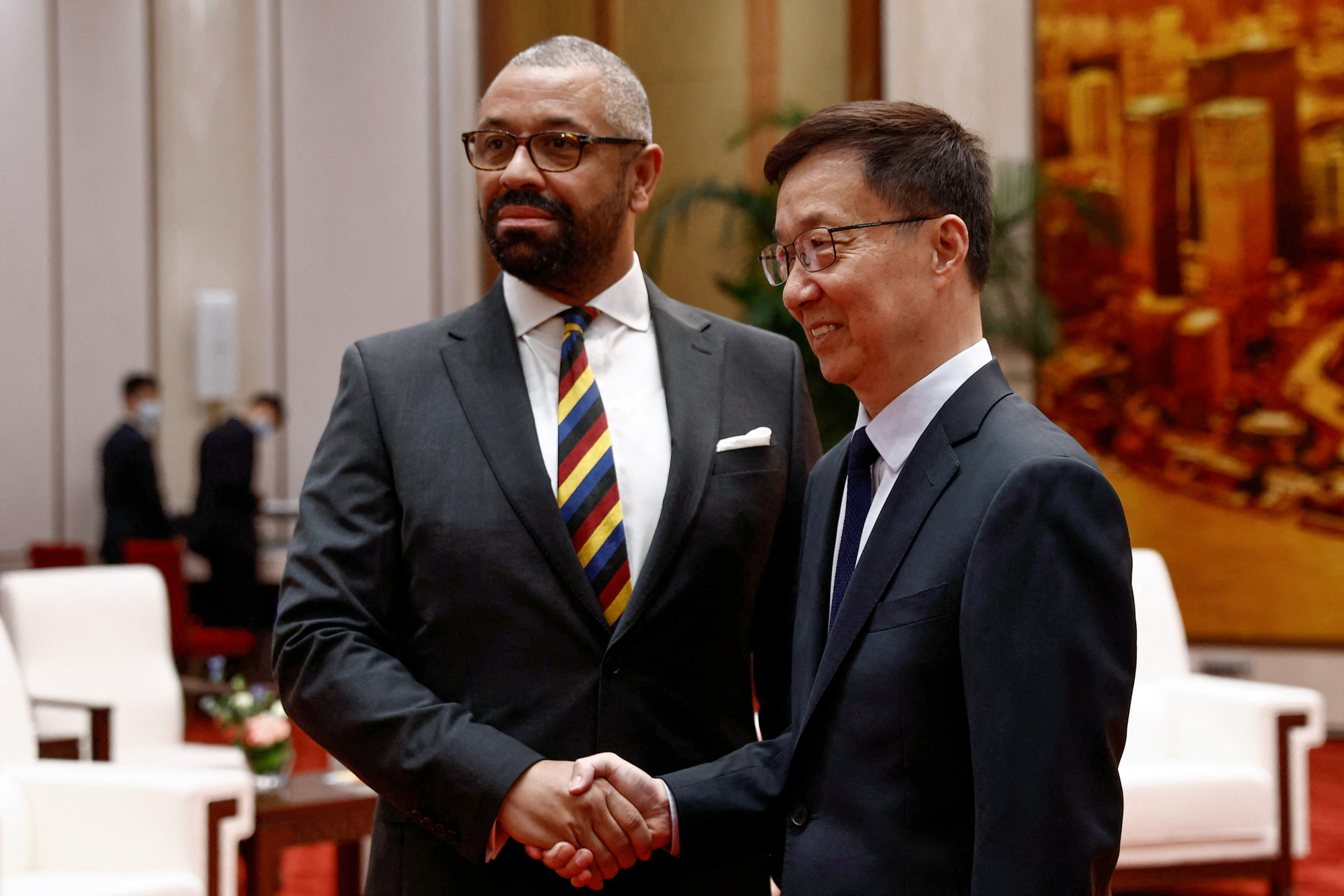British Foreign Secretary James Cleverly (left) and Chinese Vice-President Han Zheng shake hands before a meeting at the Great Hall of the People in Beijing on Wednesday. Photo: AFP
