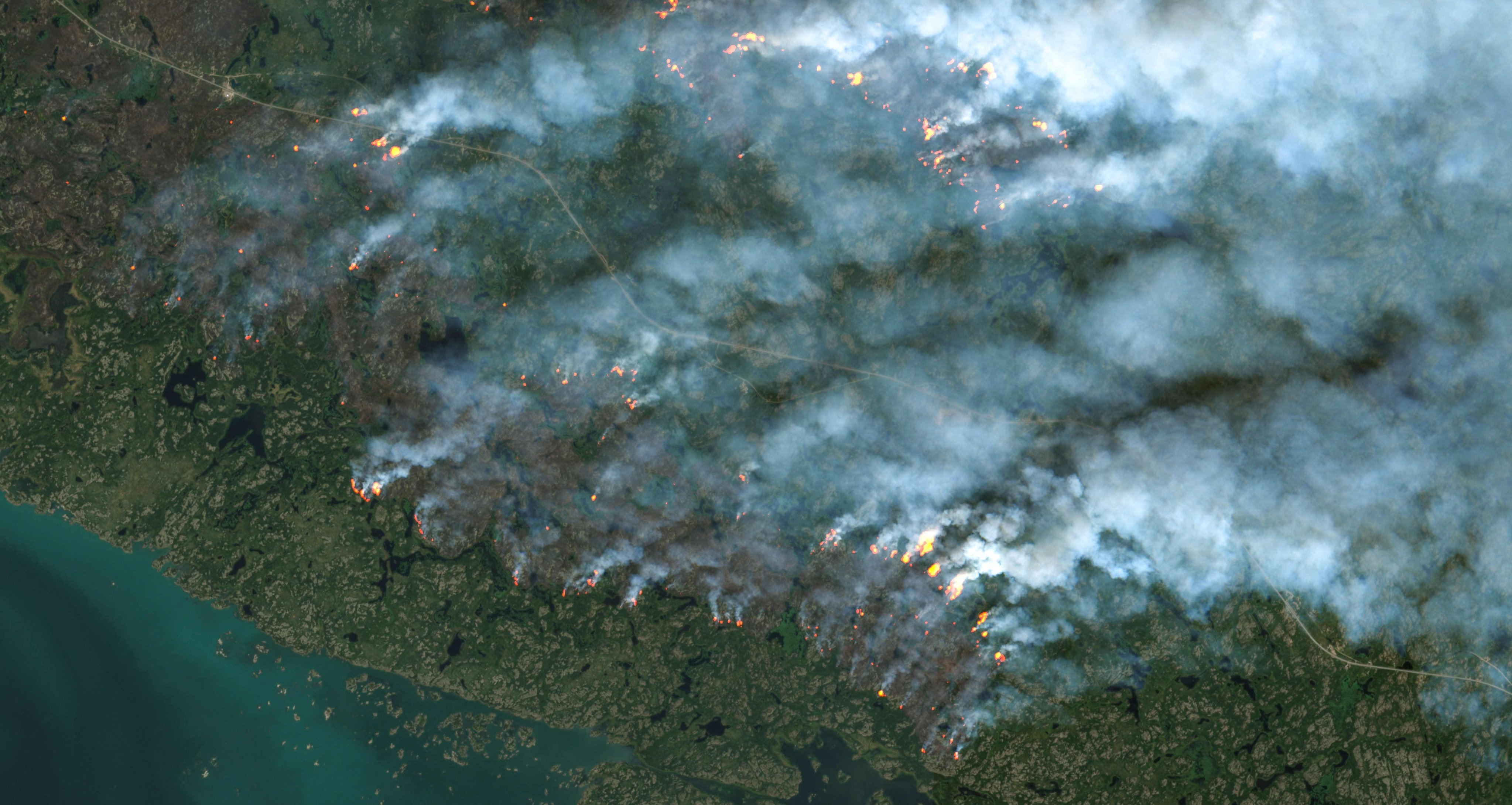 This satellite image from the European Space Agency’s Copernicus Sentinel-2 satellite taken on August 16 shows fires burning in Yellowknife, Northwest Territories, Canada. Satellites are essential to monitoring and measuring the effects of climate change. Photo: AFP/European Space Agency