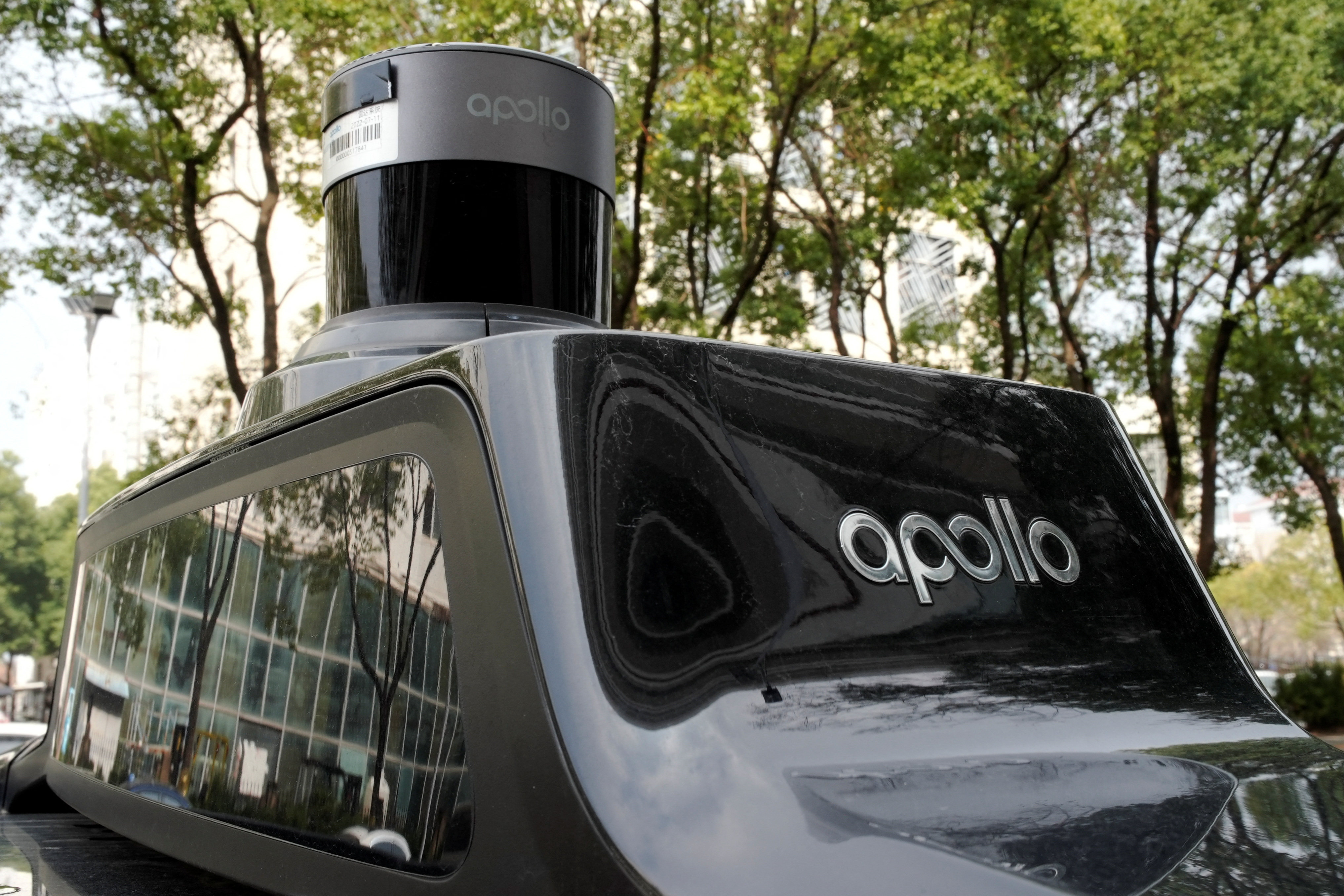 The Apollo logo is seen on Baidu’s driverless robotaxi service Apollo Go, in Wuhan, Hubei province. Photo: Reuters 