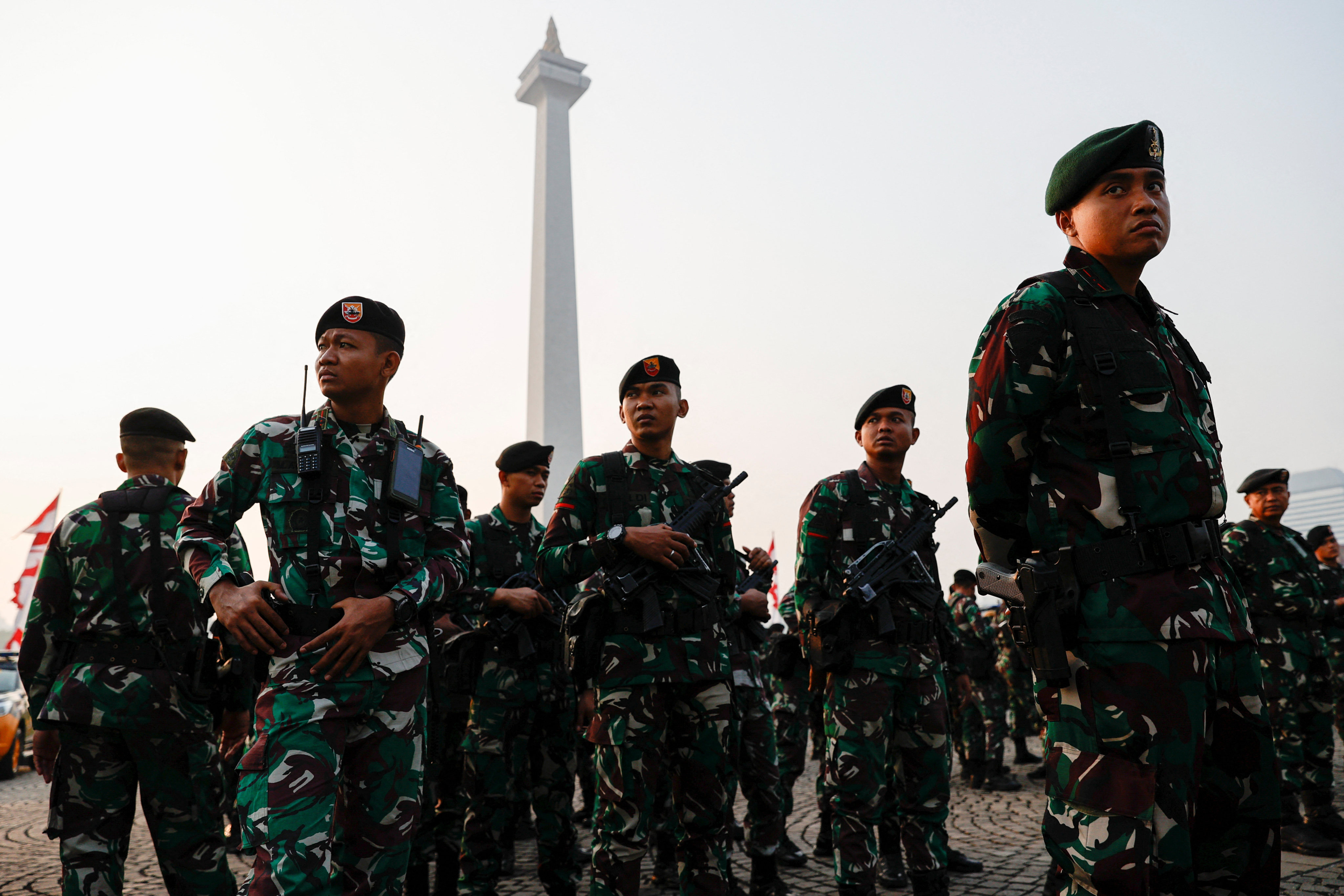 Armed Indonesian soldiers in Jakarta. The death of an Acehnese man who was allegedly kidnapped and tortured by three Indonesian soldiers has triggered painful memories of past military abuses among locals in the western province. Photo: Reuters