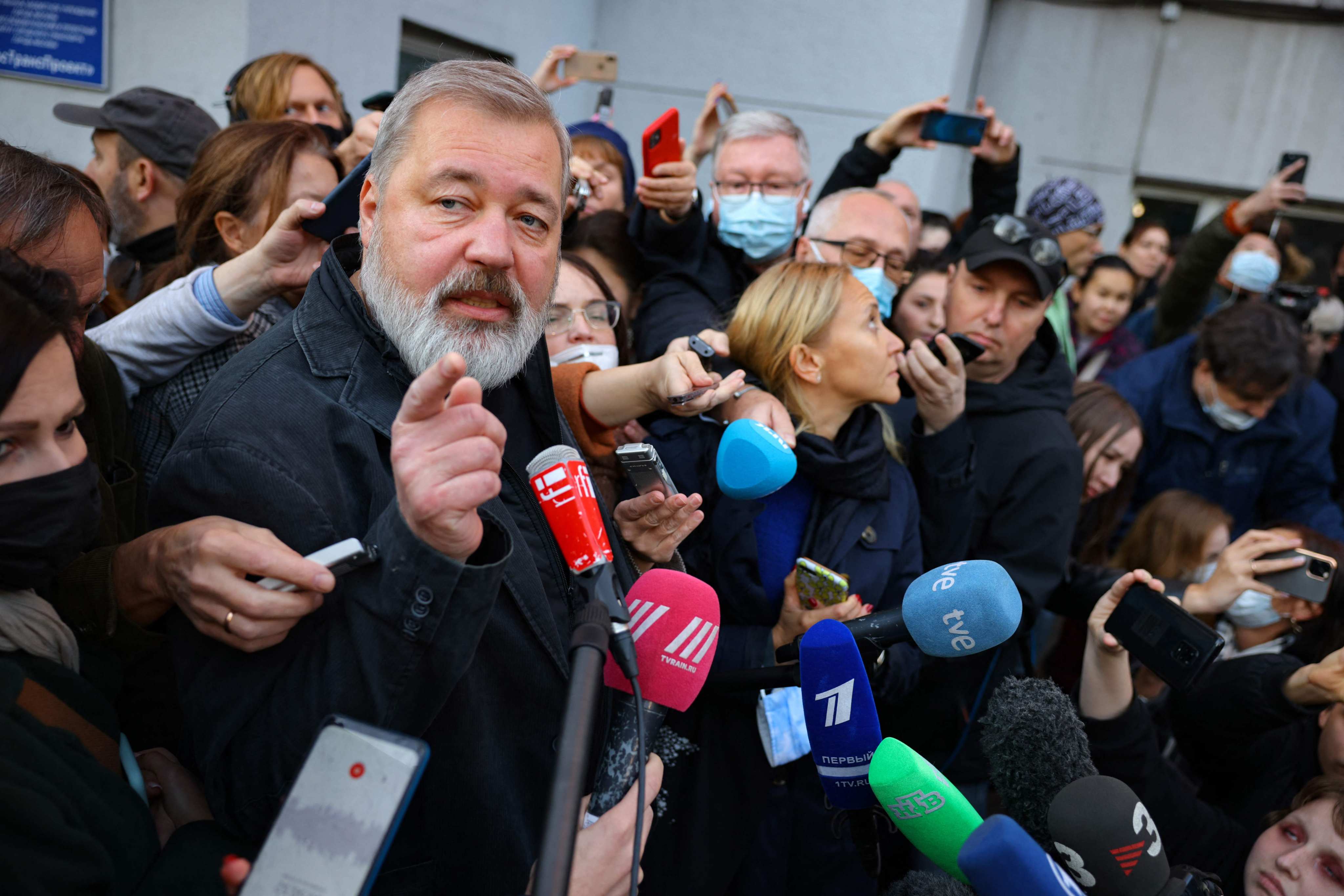 Novaya Gazeta chief editor and 2021 Nobel Peace Prize winner Dmitry Muratov meets reporters outside his newspaper’s office in Moscow in October 2021. Photo: AFP