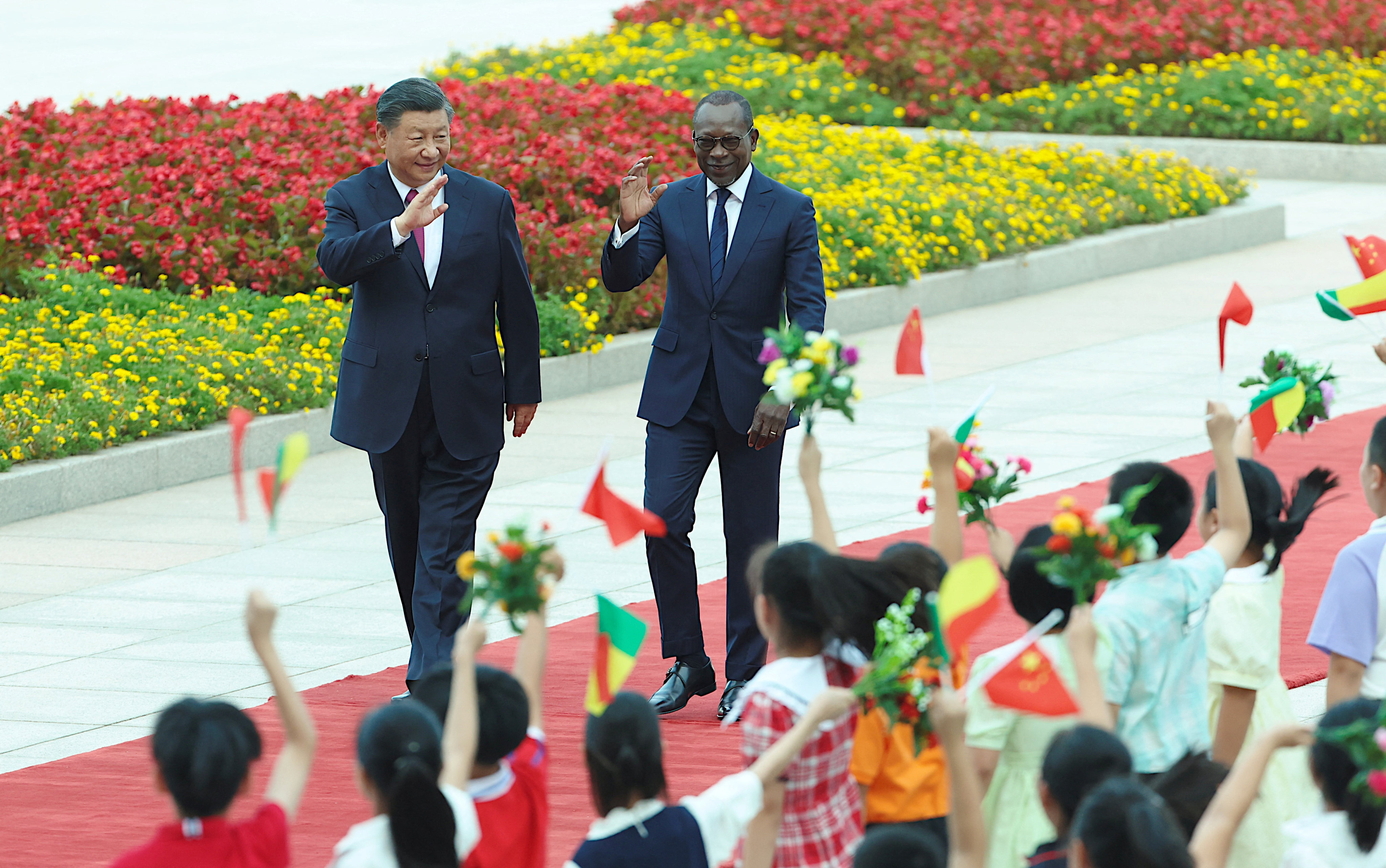 Chinese President Xi Jinping welcomes Beninese President Patrice Talon to Beijing on Friday. Photo: Reuters 
