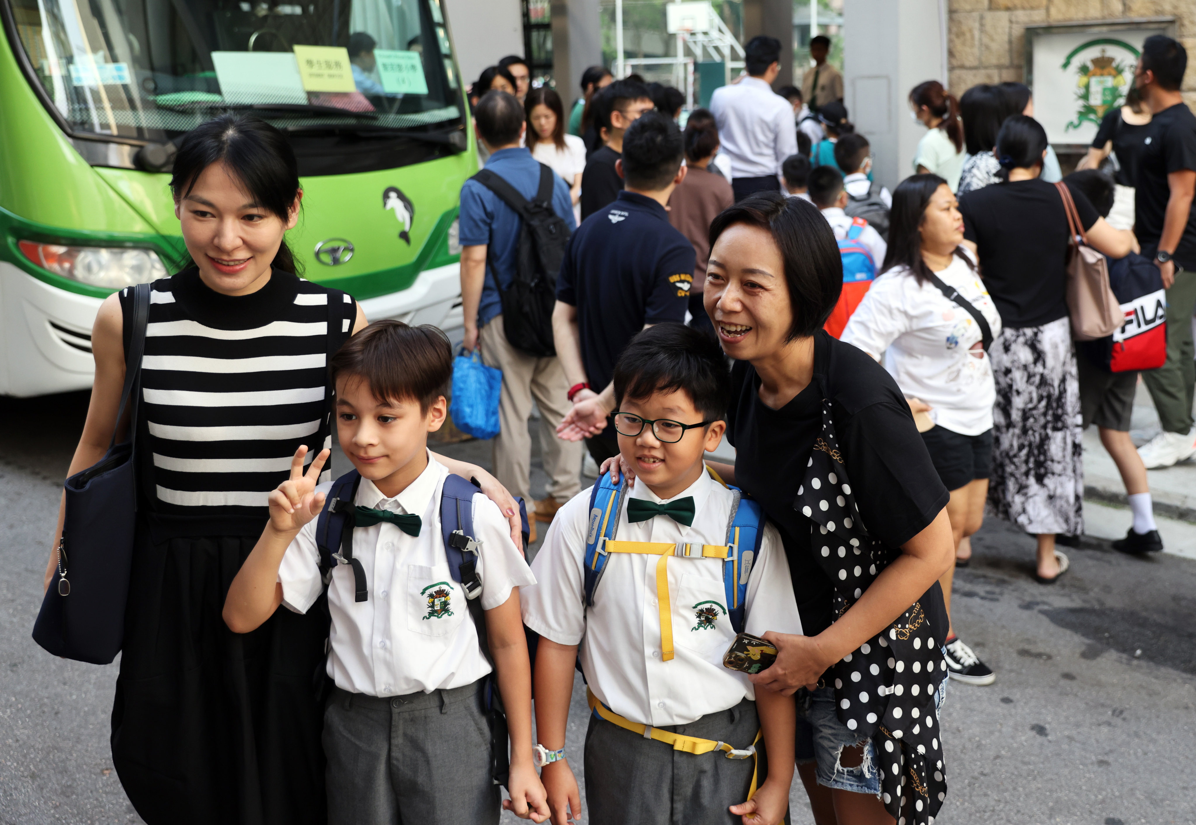 Students and parents at St Joseph’s College Primary School mark the first day of the new school year. Photo: Yik Yeung -man