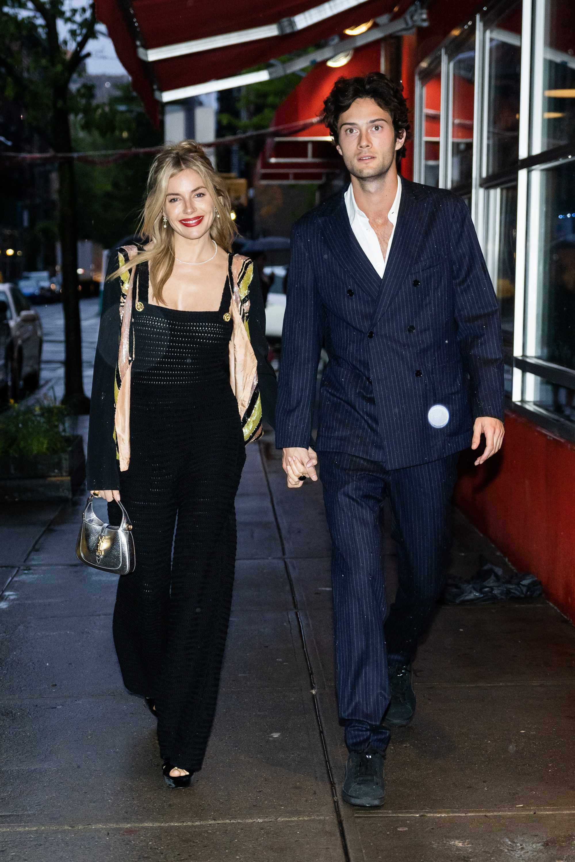 Sienna Miller (L) and Oli Green are seen arriving for a pre-Met Gala dinner hosted by Anna Wintour in SoHo on April 30, in New York City. Photo: Getty Images