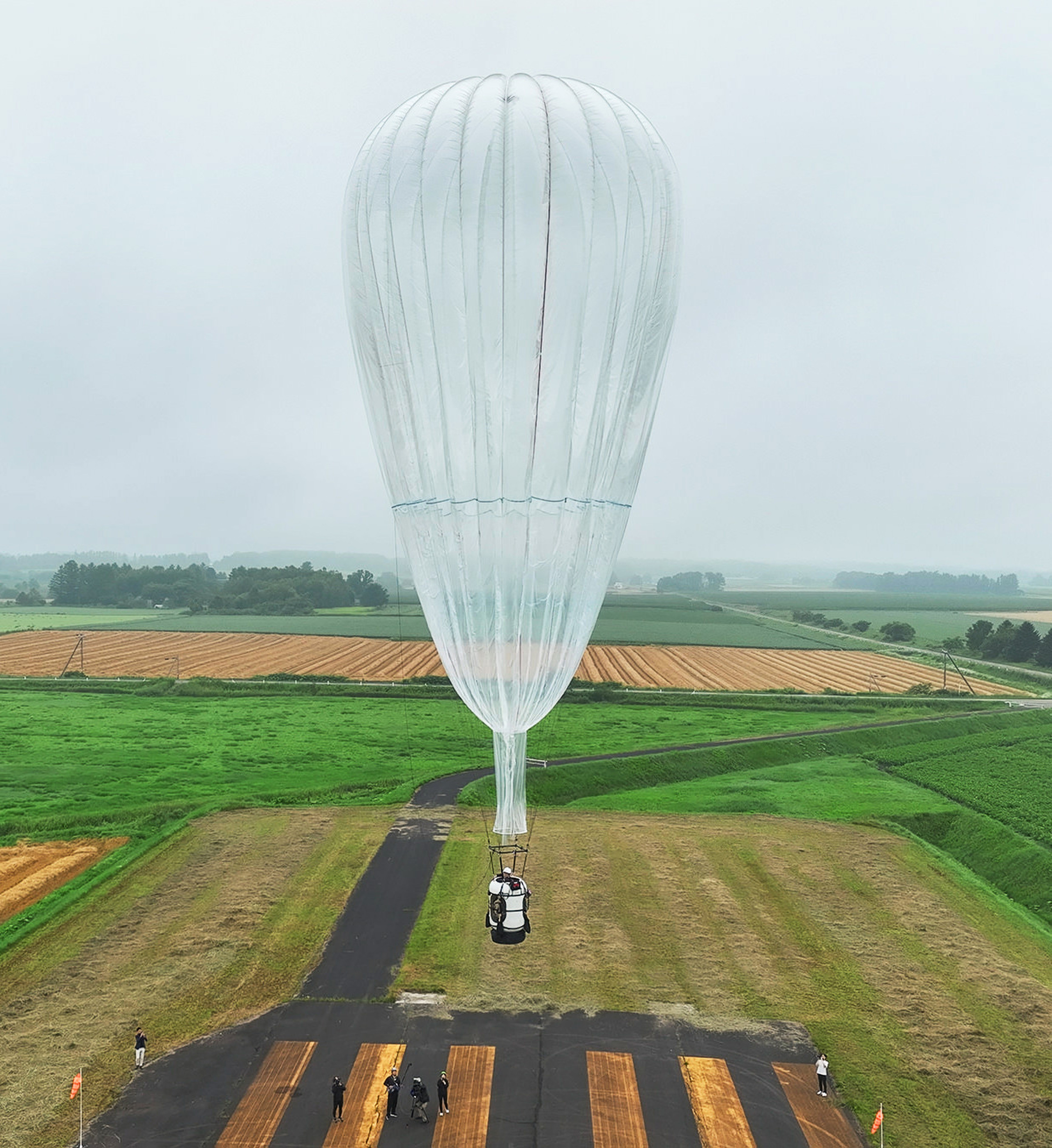 A helium balloon takes off from a test site in the Tokachi region of Hokkaido on July 23, 2023. Photo: Iwaya Inc
