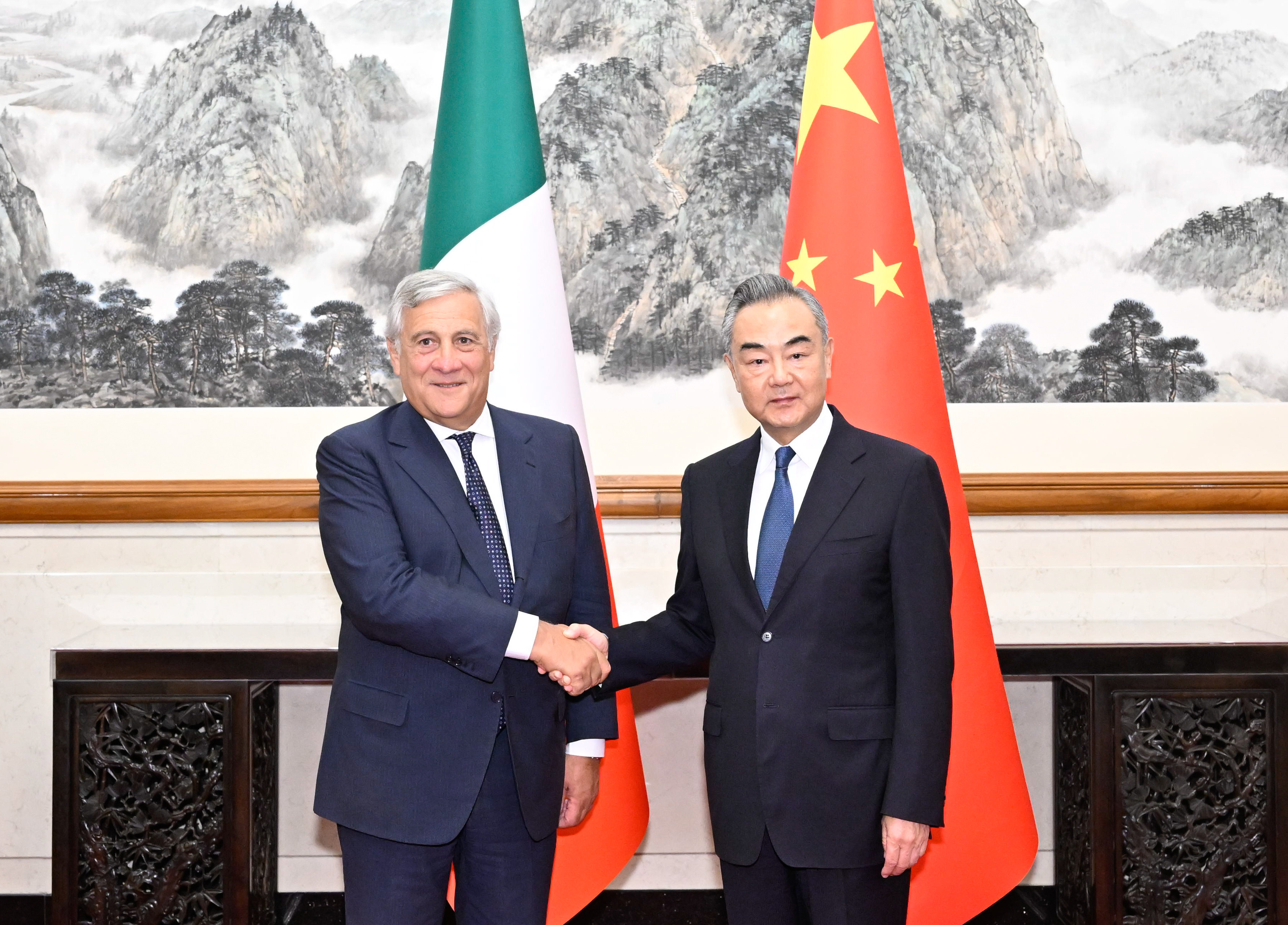 Italian Foreign Minister Antonio Tajani (left) and his Chinese counterpart Wang Yi in Beijing on Monday. Photo: Xinhua